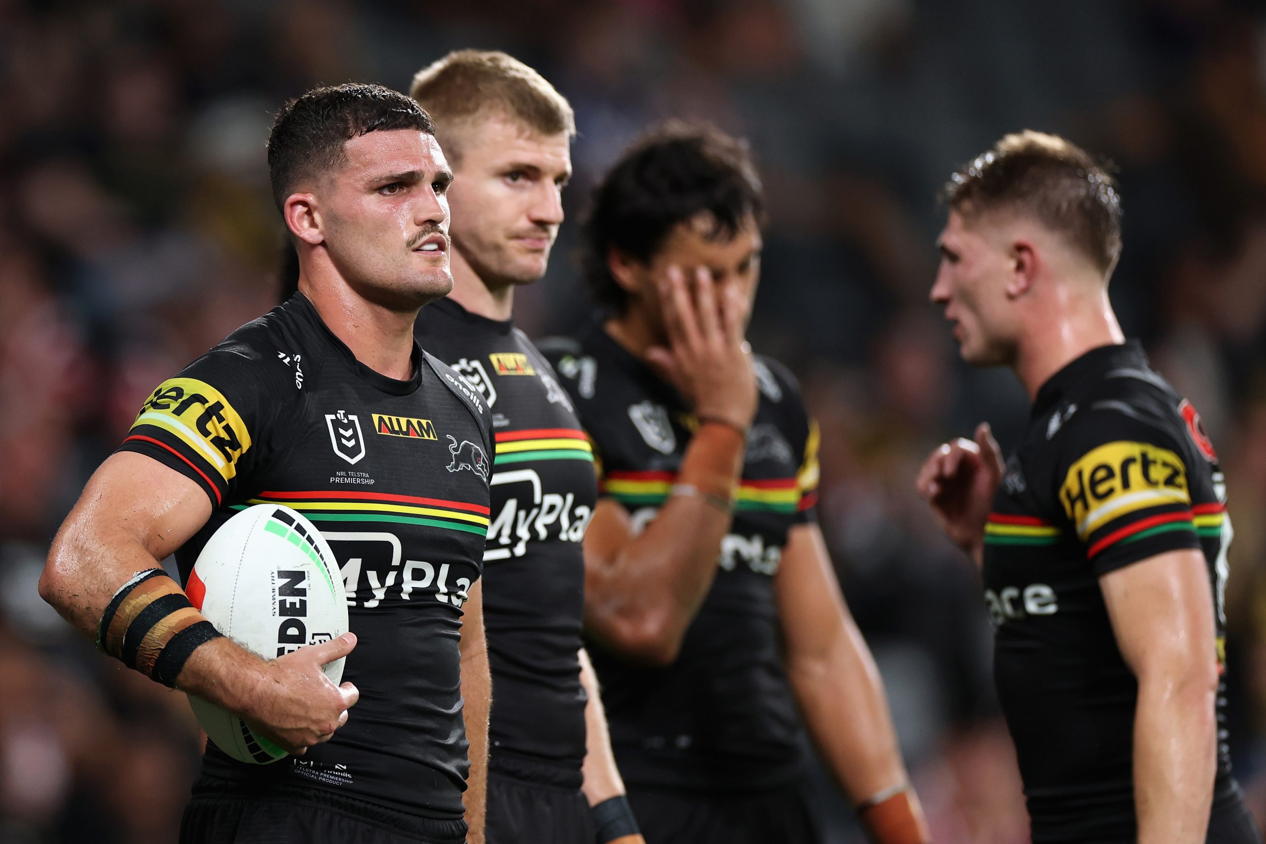 Nathan Cleary of the Panthers and team mates look on after loss.