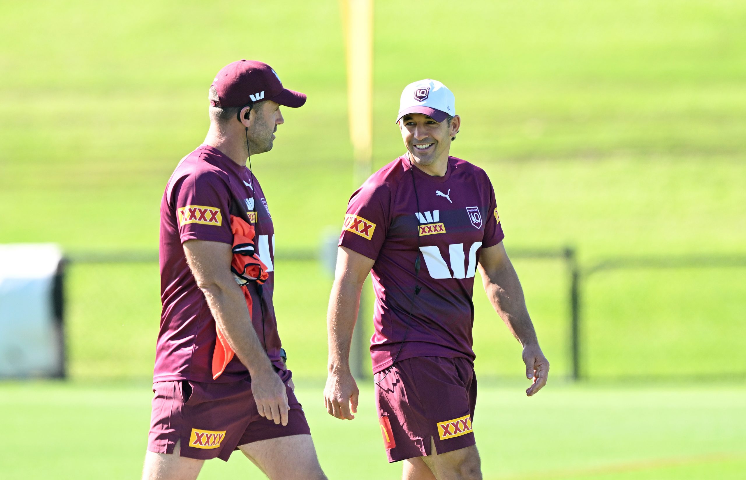 Coach Billy Slater chats with his assistant Josh Hannay during a training session.