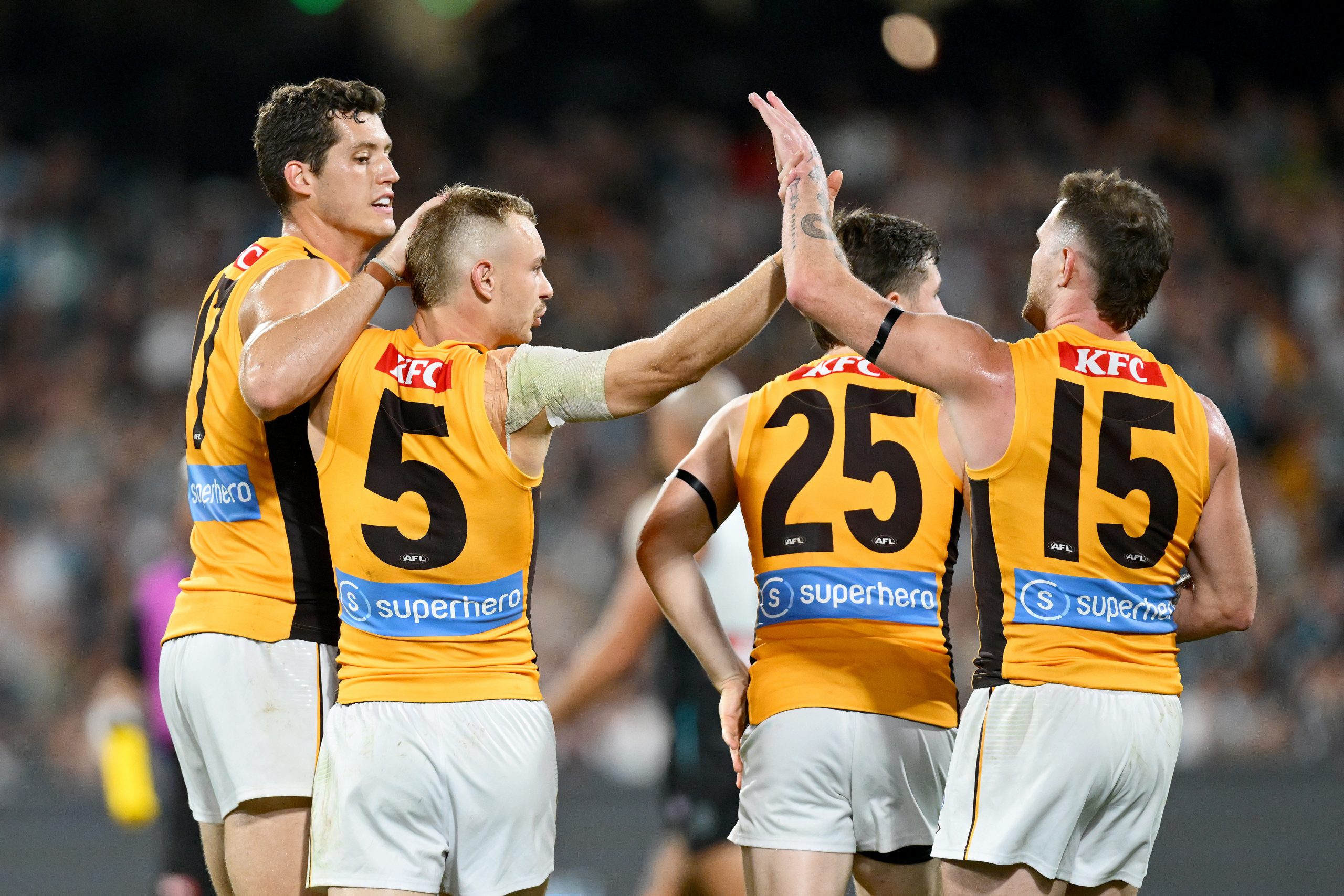 James Worpel of the Hawks celebrates with team mates during the round five AFL match between Port Adelaide Power and Hawthorn Hawks at Adelaide Oval, on April 13, 2025, in Adelaide, Australia. 