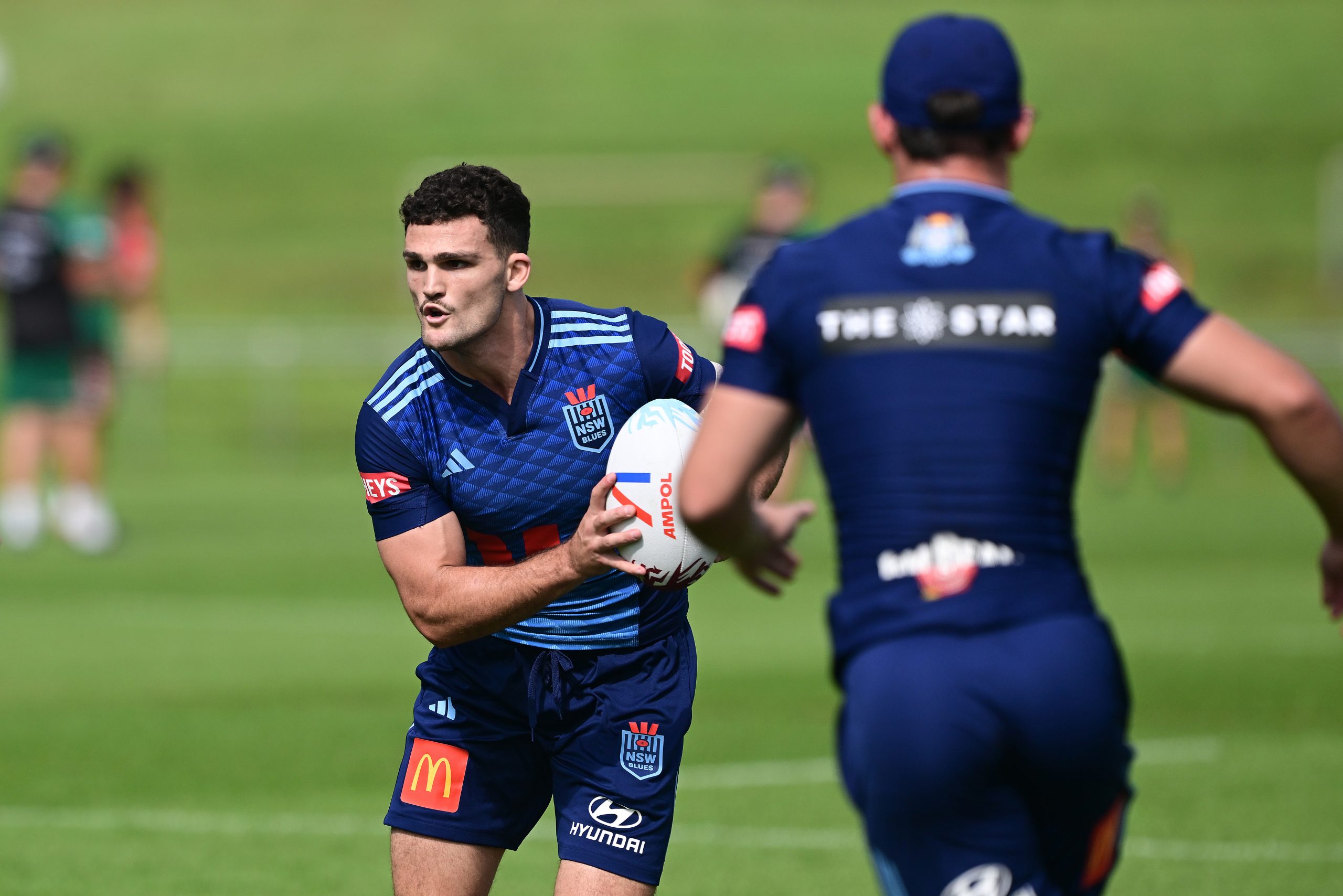 Nathan Cleary looks to pass during Blues training.