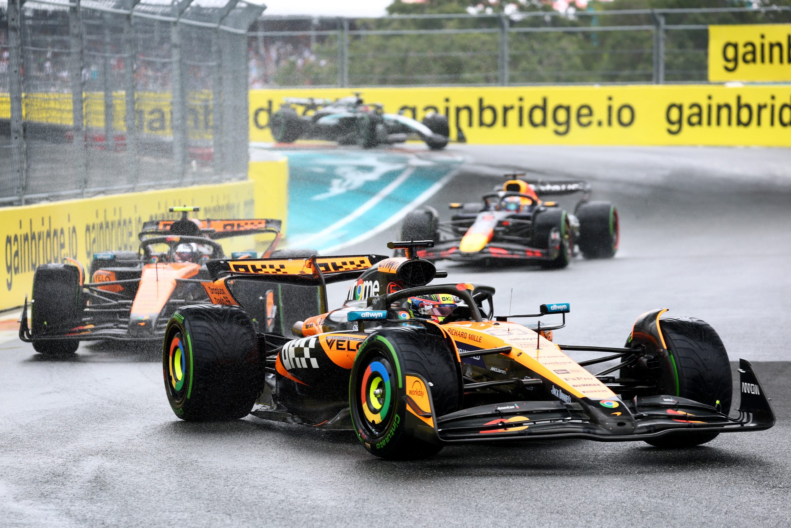 Oscar Piastri in the MCL39 Mercedes leads teammate McLaren Lando Norris and Max Verstappen in RB21 during the Miami Grand Prix.