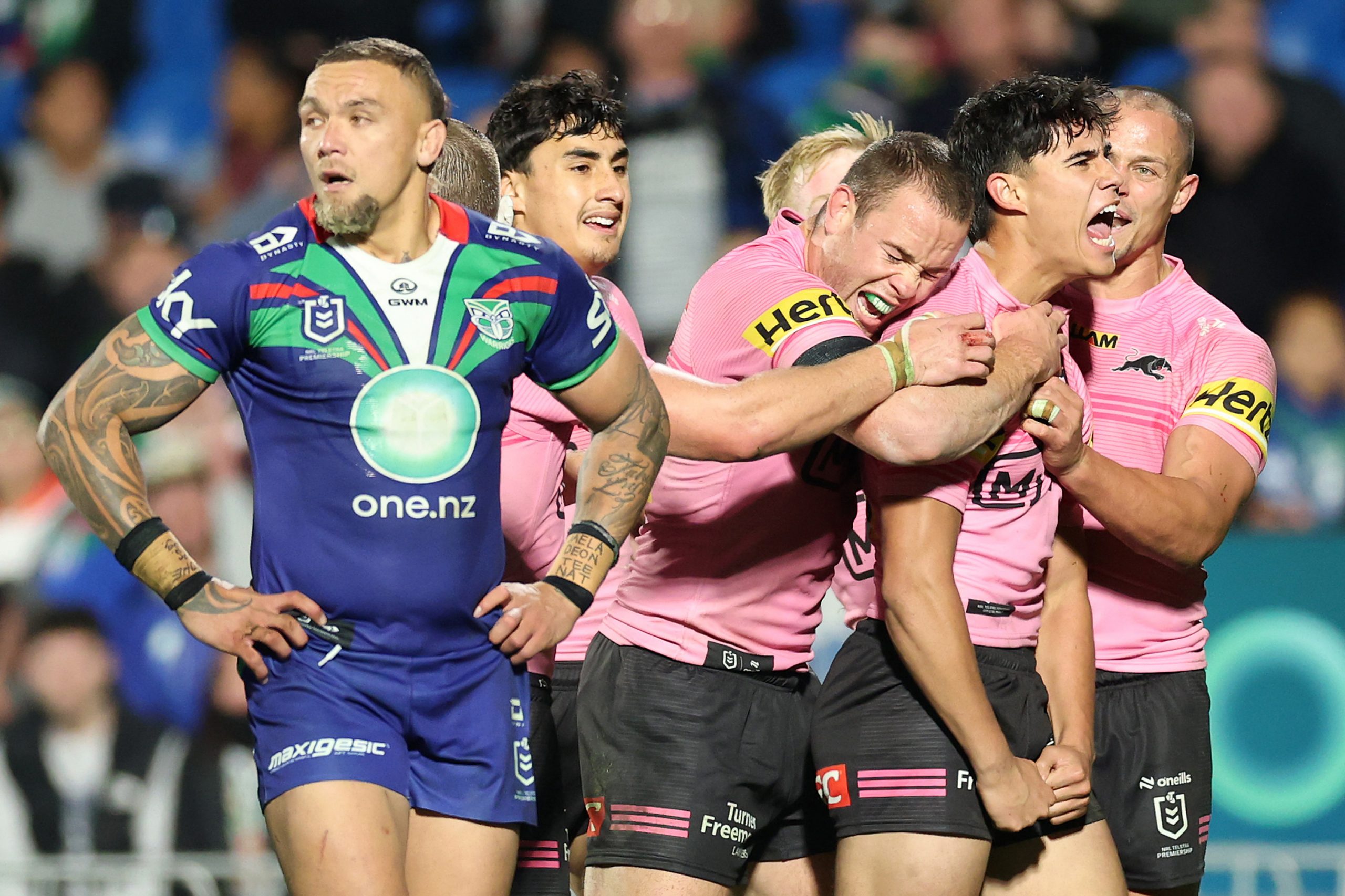 Blaize Talagi of the Panthers celebrates with team mates after scoring a try during the round 16 NRL match between the New Zealand Warriors and Penrith Panthers at Go Media Stadium on June 21, 2025, in Auckland, New Zealand. (Photo by Phil Walter/Getty Images)