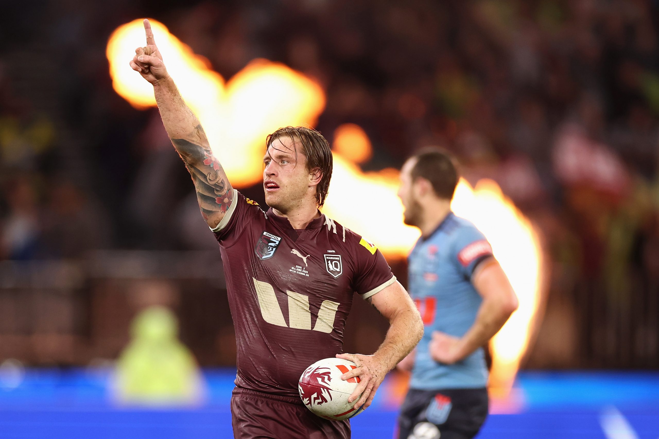 New Maroons skipper Cameron Munster celebrates winning game two to square up the series. 