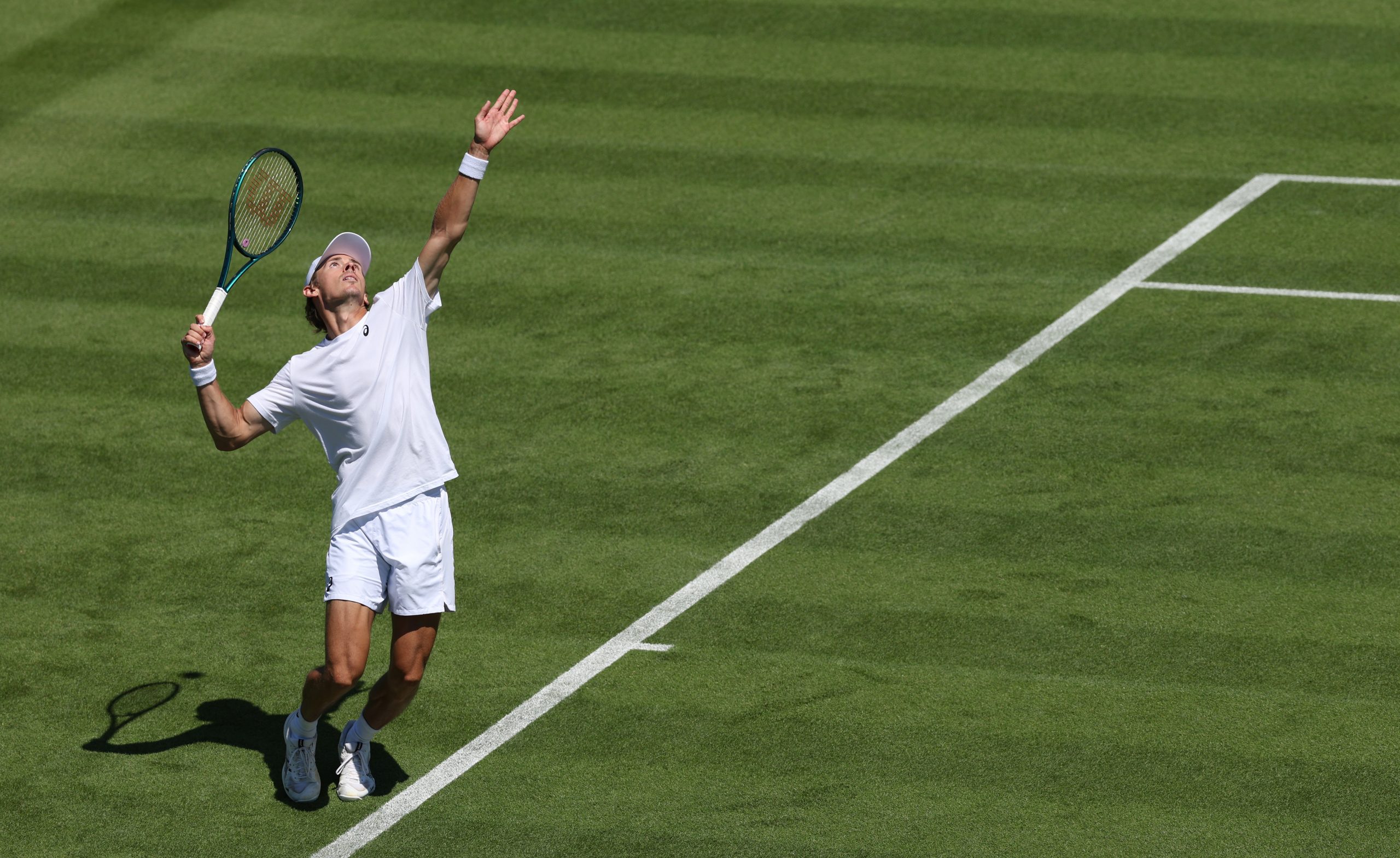 Alex de Minaur of Australia serves during a practice session prior to The Championships Wimbledon 2025 at All England Lawn Tennis and Croquet Club on June 27, 2025 in London, England. (Photo by Clive Brunskill/Getty Images)