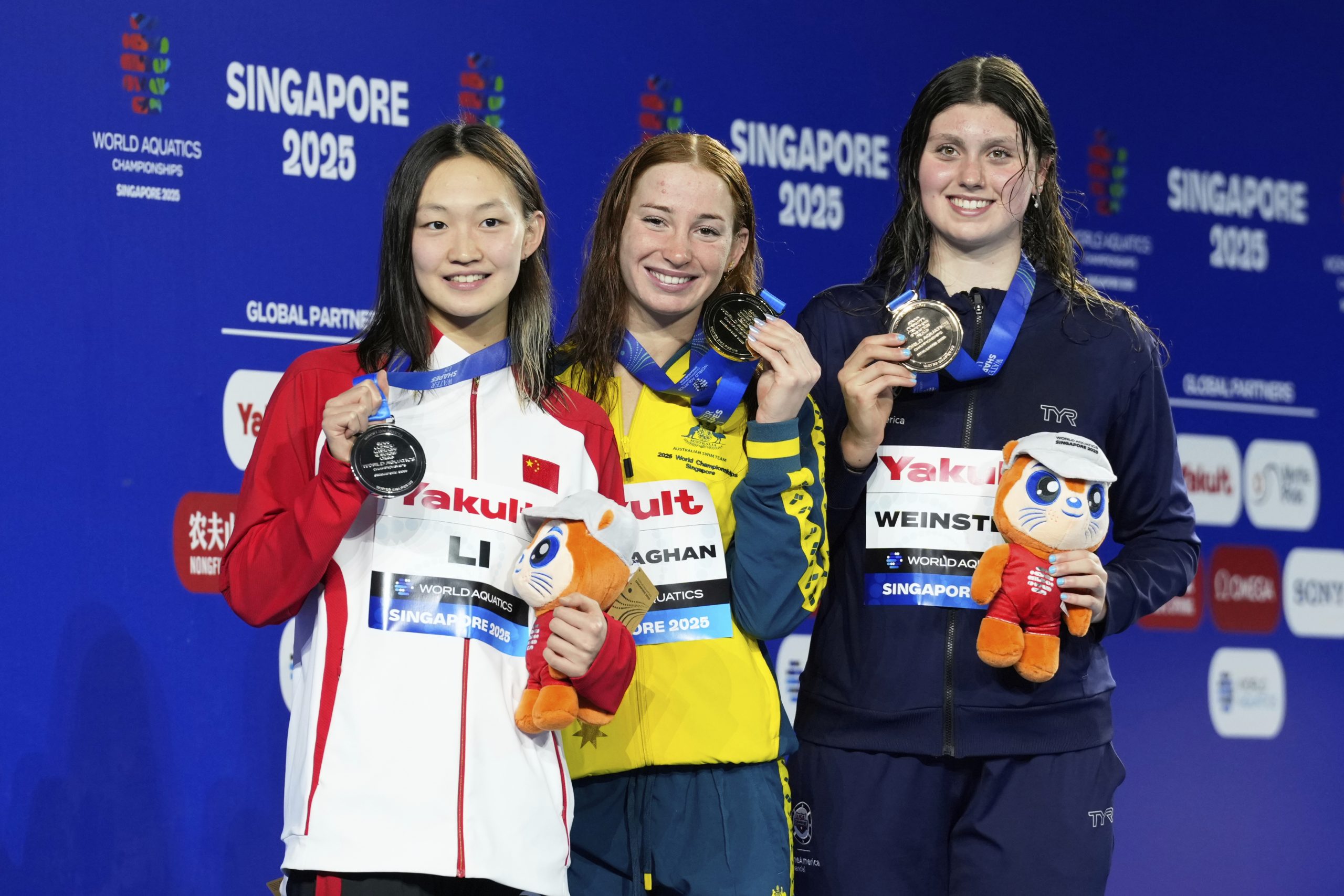 From left to right: Silver medallist Bingjie Li, gold medallist Mollie O'Callaghan and bronze medallist Claire Weinstein.