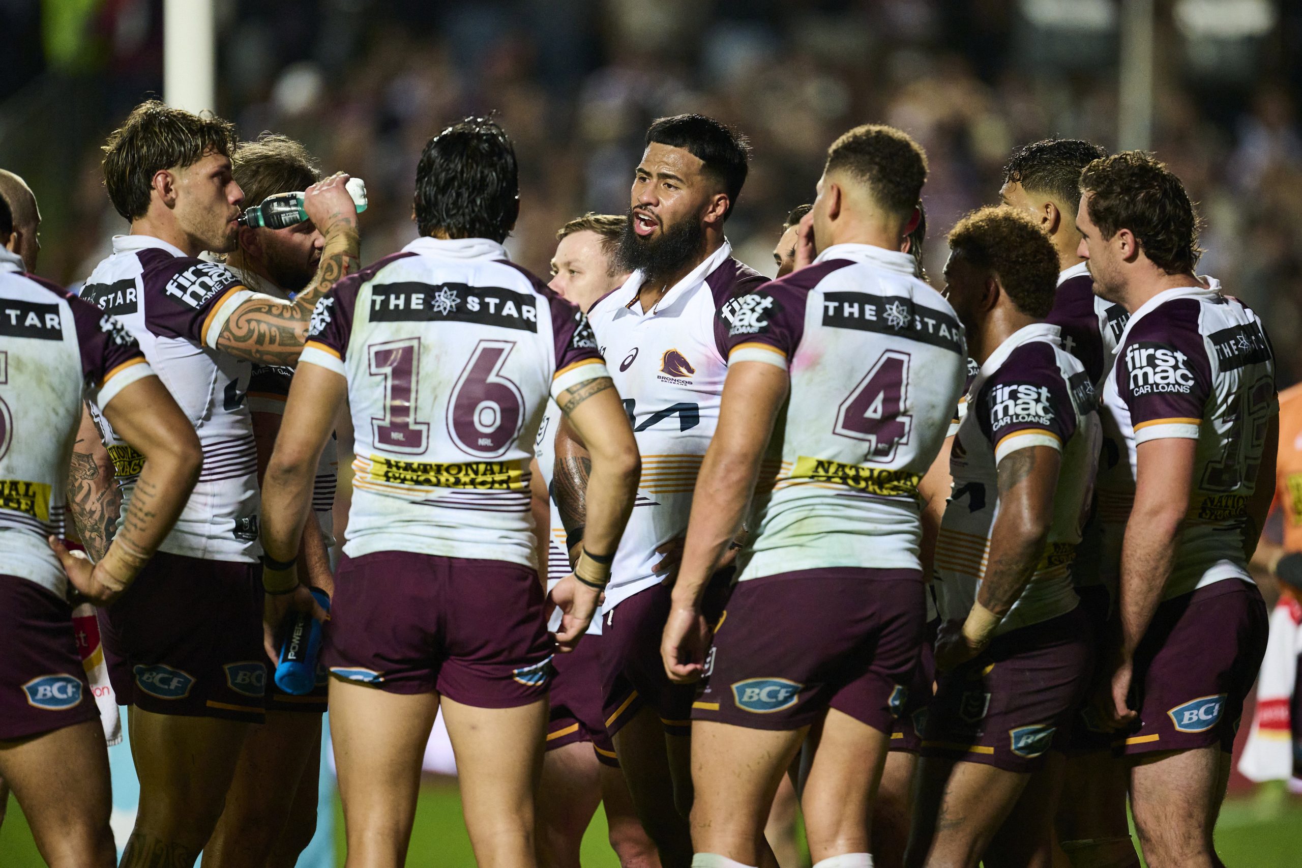 Broncos players react after conceding a try against Manly in round 13.