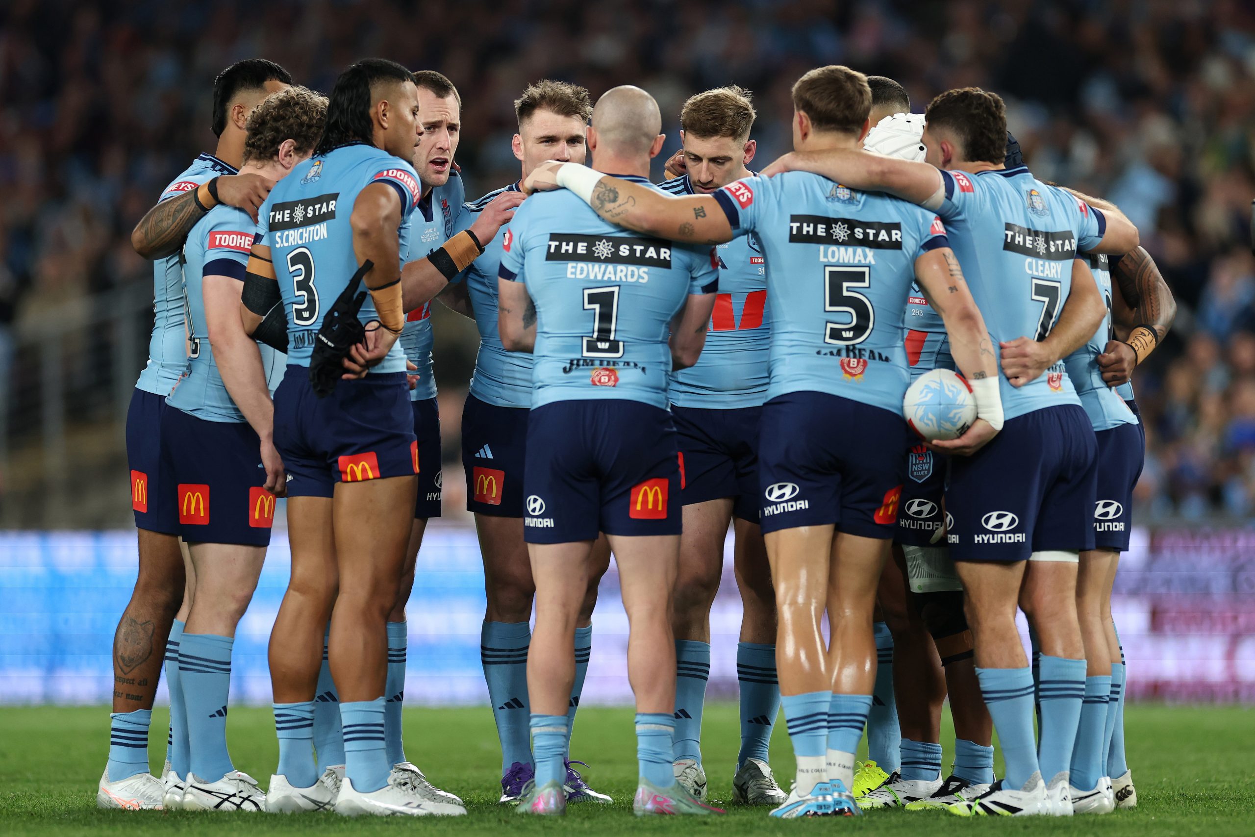 The Blues regroup after Xavier Coates scored the opening try for the Maroons. 