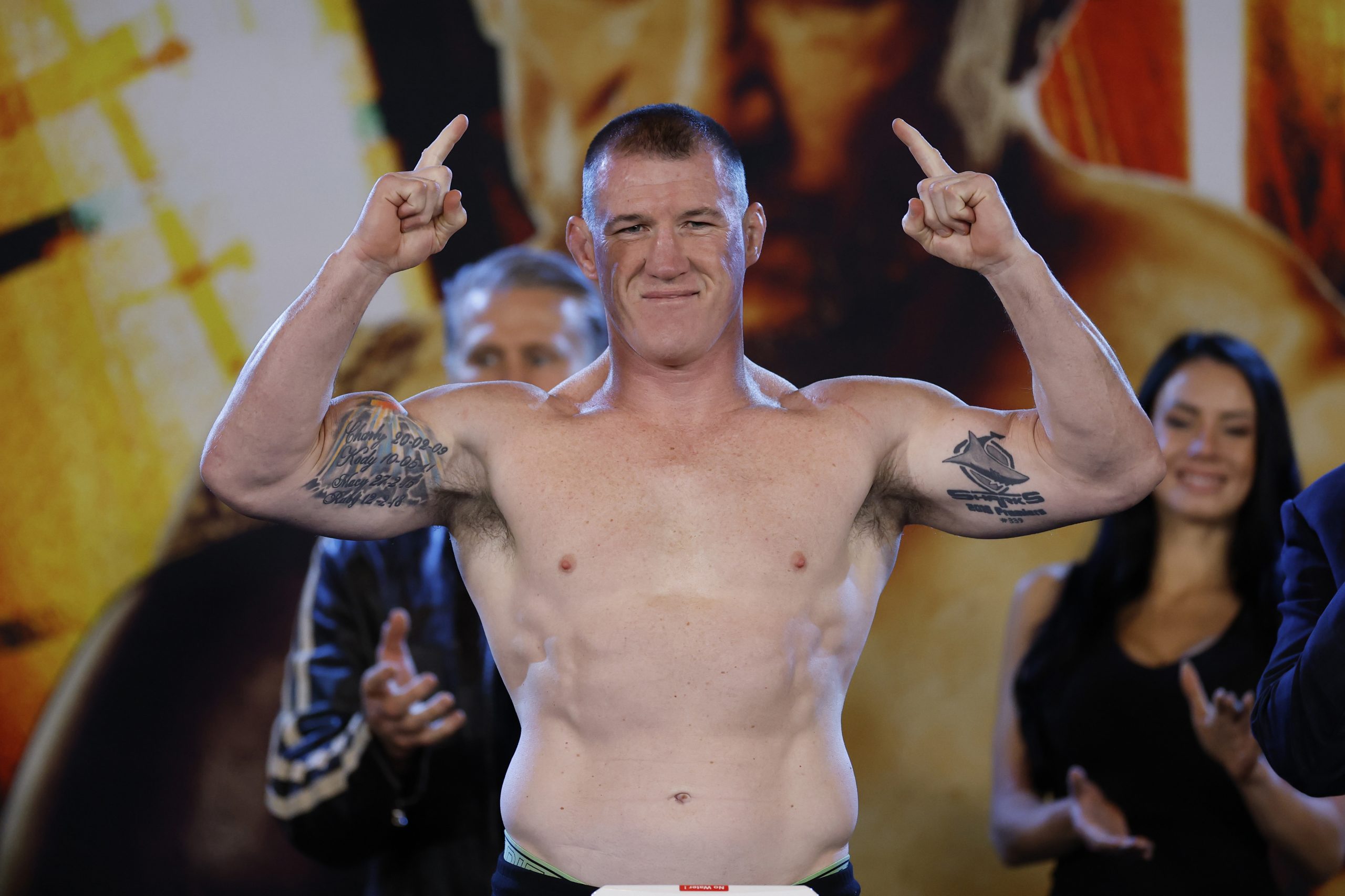Paul Gallen stands on the scales during his weigh-in at Qudos Bank Arena.