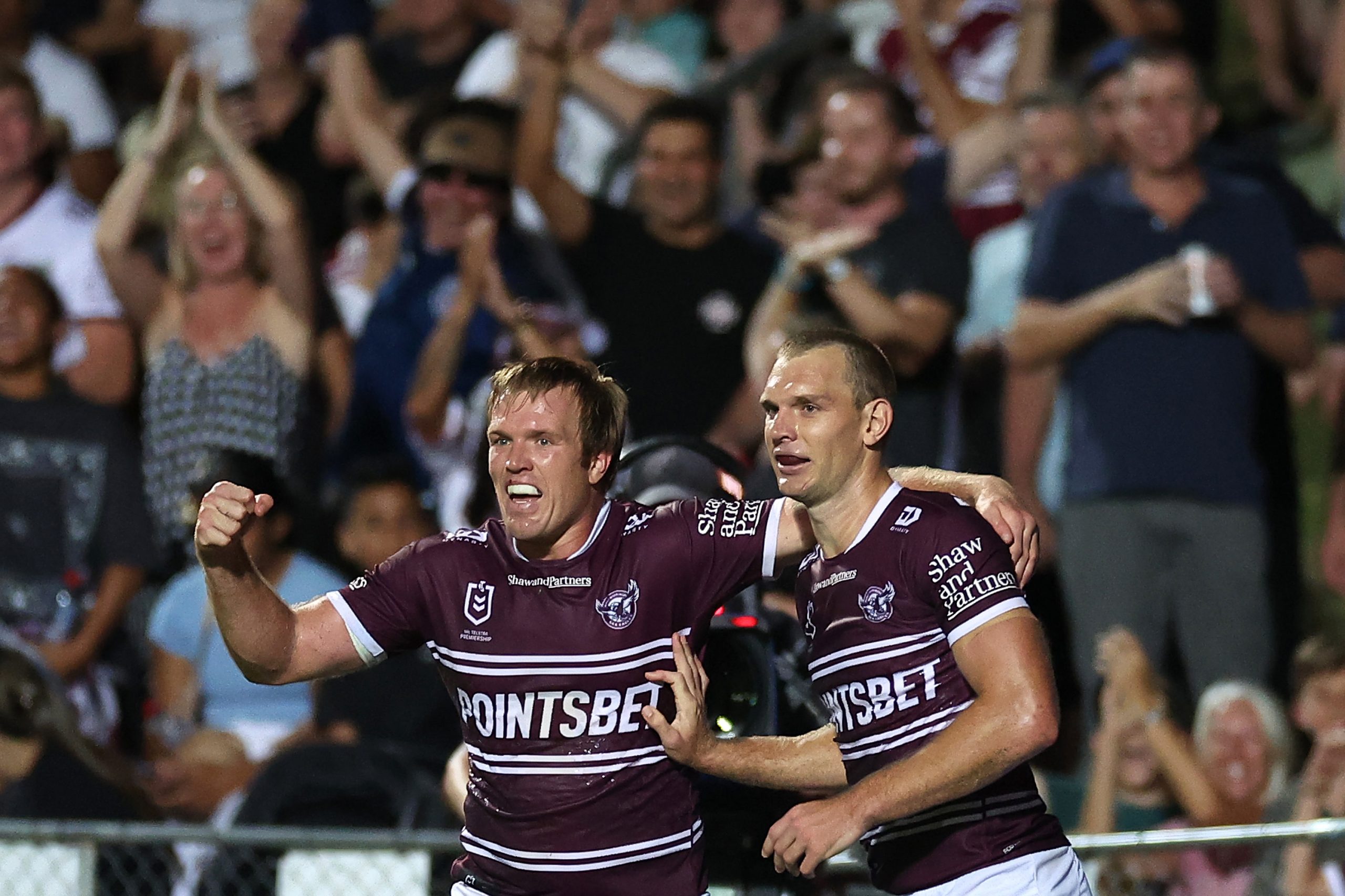 SYDNEY, AUSTRALIA - MARCH 16:  Tom Trbojevic (R) of the Sea Eagles celebrates with Jake Trbojevic of the Sea Eagles after scoring a try during the round three NRL match between Manly Sea Eagles and Parramatta Eels at 4 Pines Park on March 16, 2023 in Sydney, Australia. (Photo by Cameron Spencer/Getty Images)