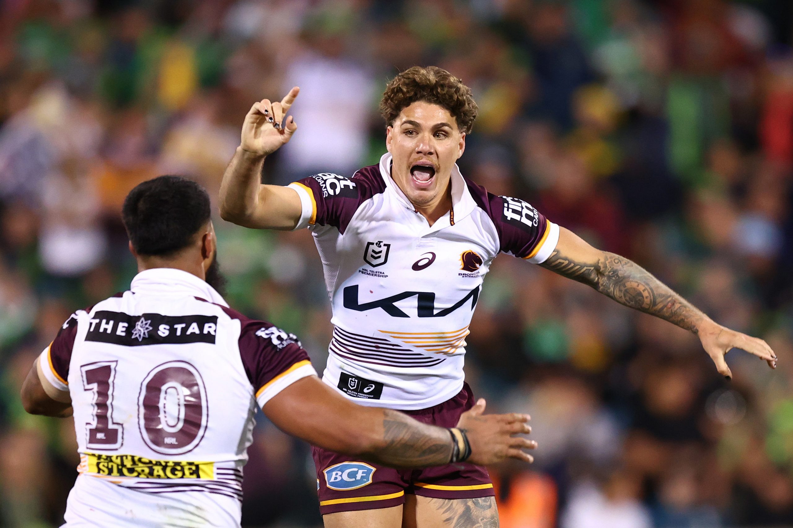 Broncos star Payne Haas celebrates with Reece Walsh during the NRL Qualifying Final match between Canberra Raiders and Brisbane Broncos at GIO Stadium, on September 14, 2025, in Canberra, Australia. (Photo by Mark Nolan/Getty Images)