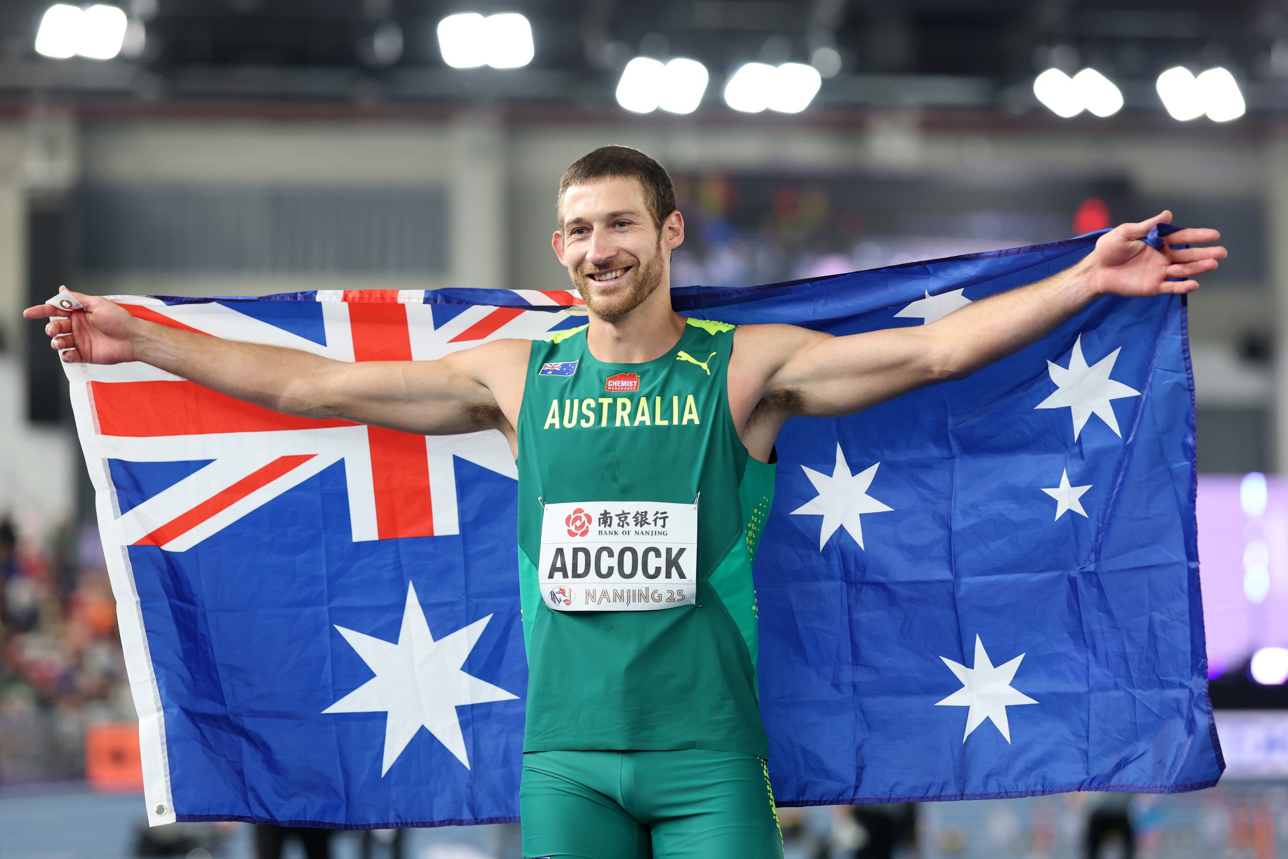 Liam Adcock celebrates becoming a global medallist.