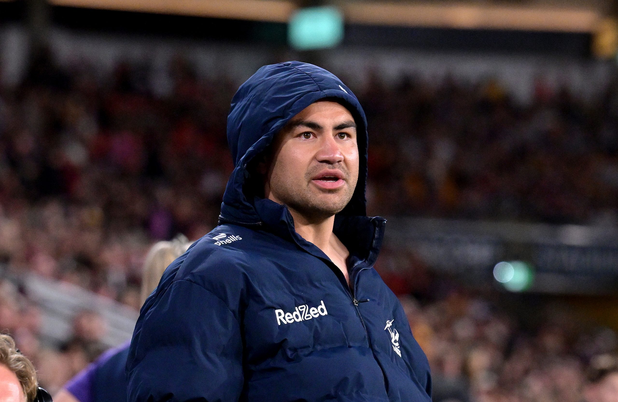 BRISBANE, AUSTRALIA - SEPTEMBER 04: Jahrome Hughes of the Storm is seen watching on after injuring his hand during the round 27 NRL match between Brisbane Broncos and Melbourne Storm at Suncorp Stadium, on September 04, 2025, in Brisbane, Australia. (Photo by Bradley Kanaris/Getty Images)