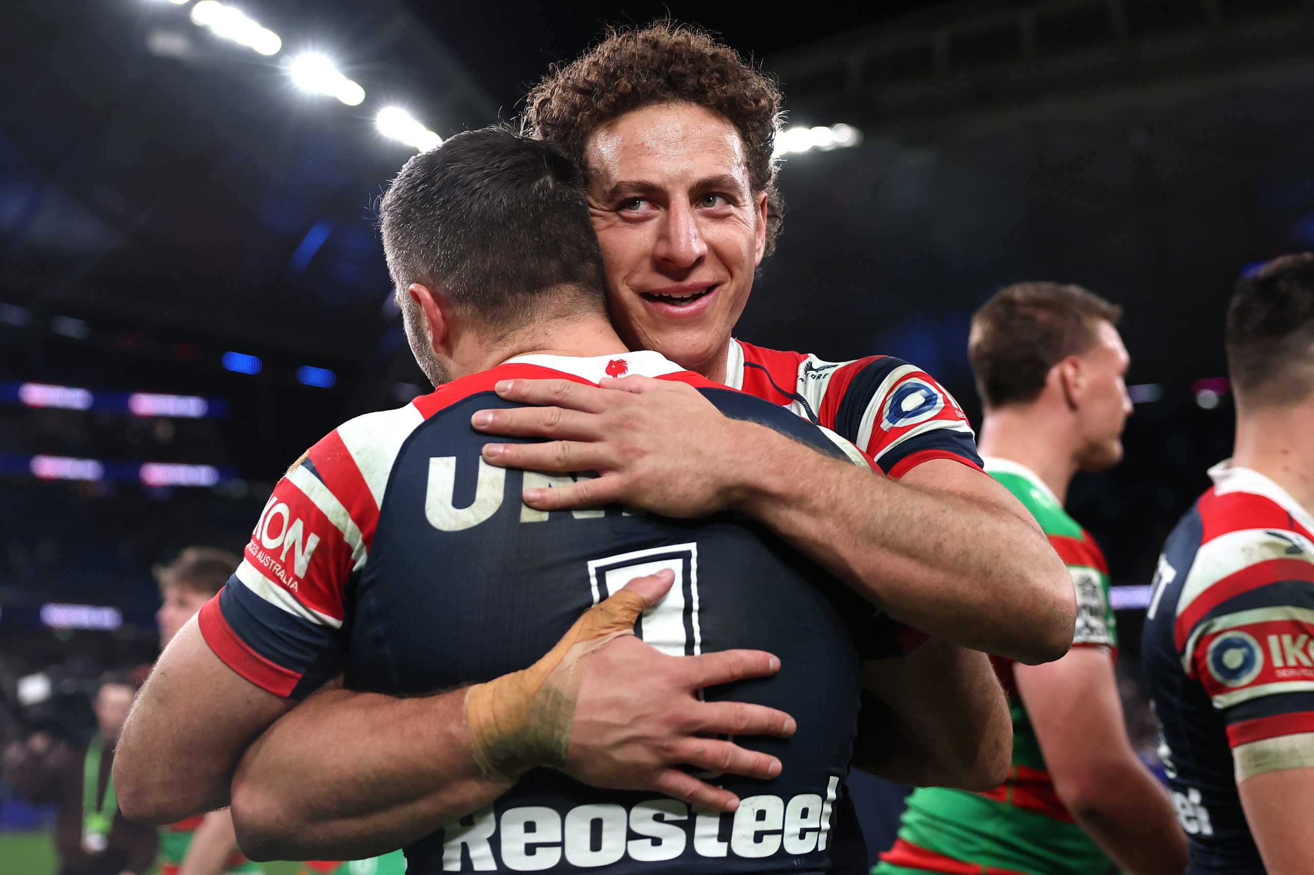 SYDNEY, AUSTRALIA - SEPTEMBER 05: Mark Nawaqanitawase and James Tedesco of the Roosters celebrate winning the round 27 NRL match between the Sydney Roosters and South Sydney Rabbitohs at Allianz Stadium on September 05, 2025, in Sydney, Australia. (Photo by Cameron Spencer/Getty Images)