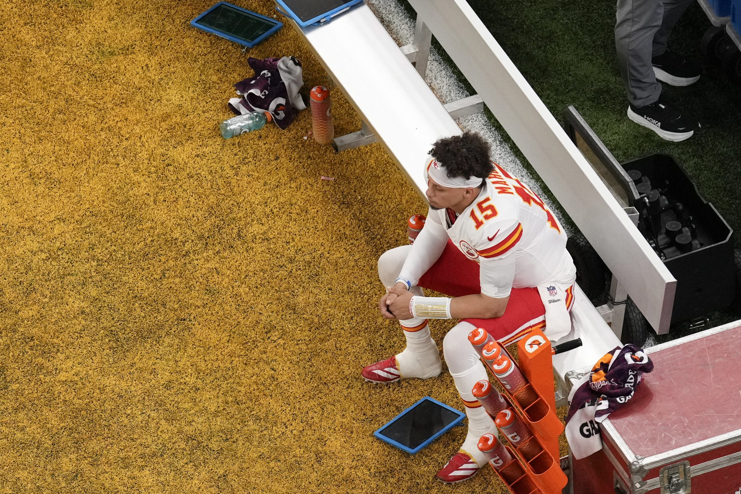 Kansas City Chiefs quarterback Patrick Mahomes (15) sits on the bench during the first half of the NFL Super Bowl 59 football game against the Philadelphia Eagles, Sunday, Feb. 9, 2025, in New Orleans. 