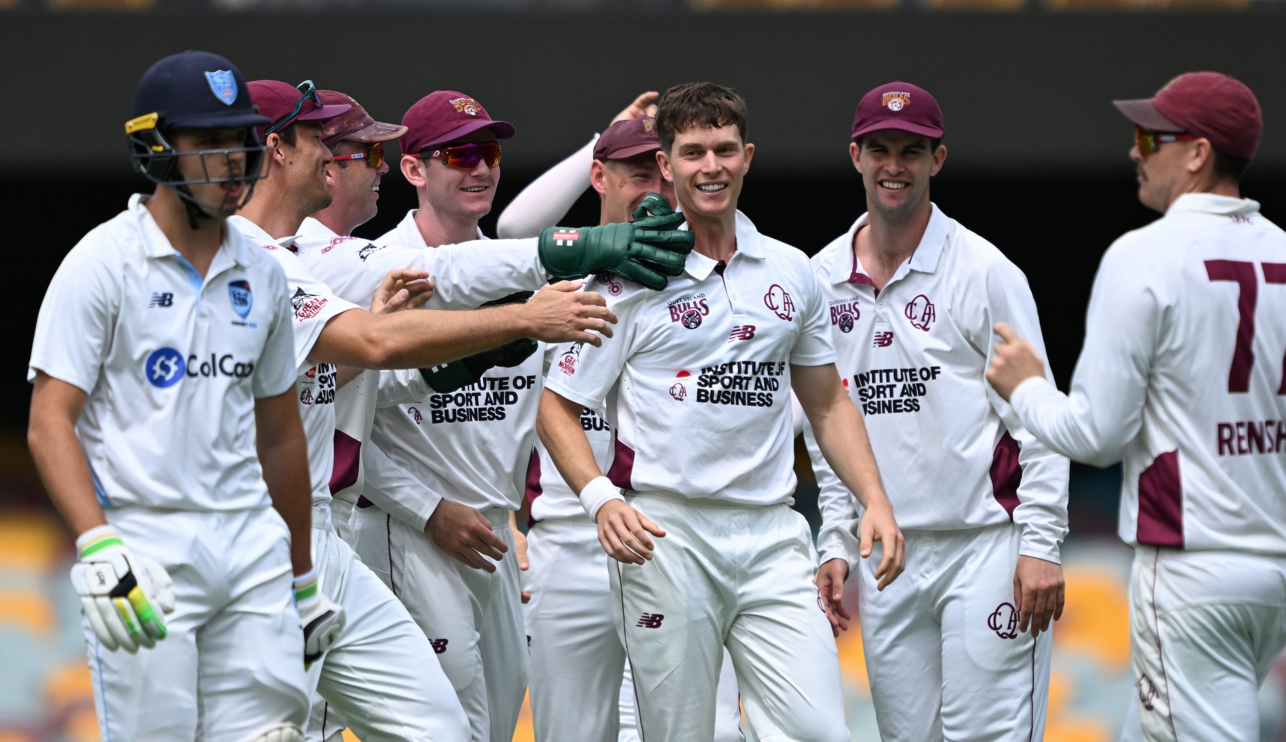 Hayden Kerr of Queensland celebrates taking the wicket of Sam Konstas of New South Wales.