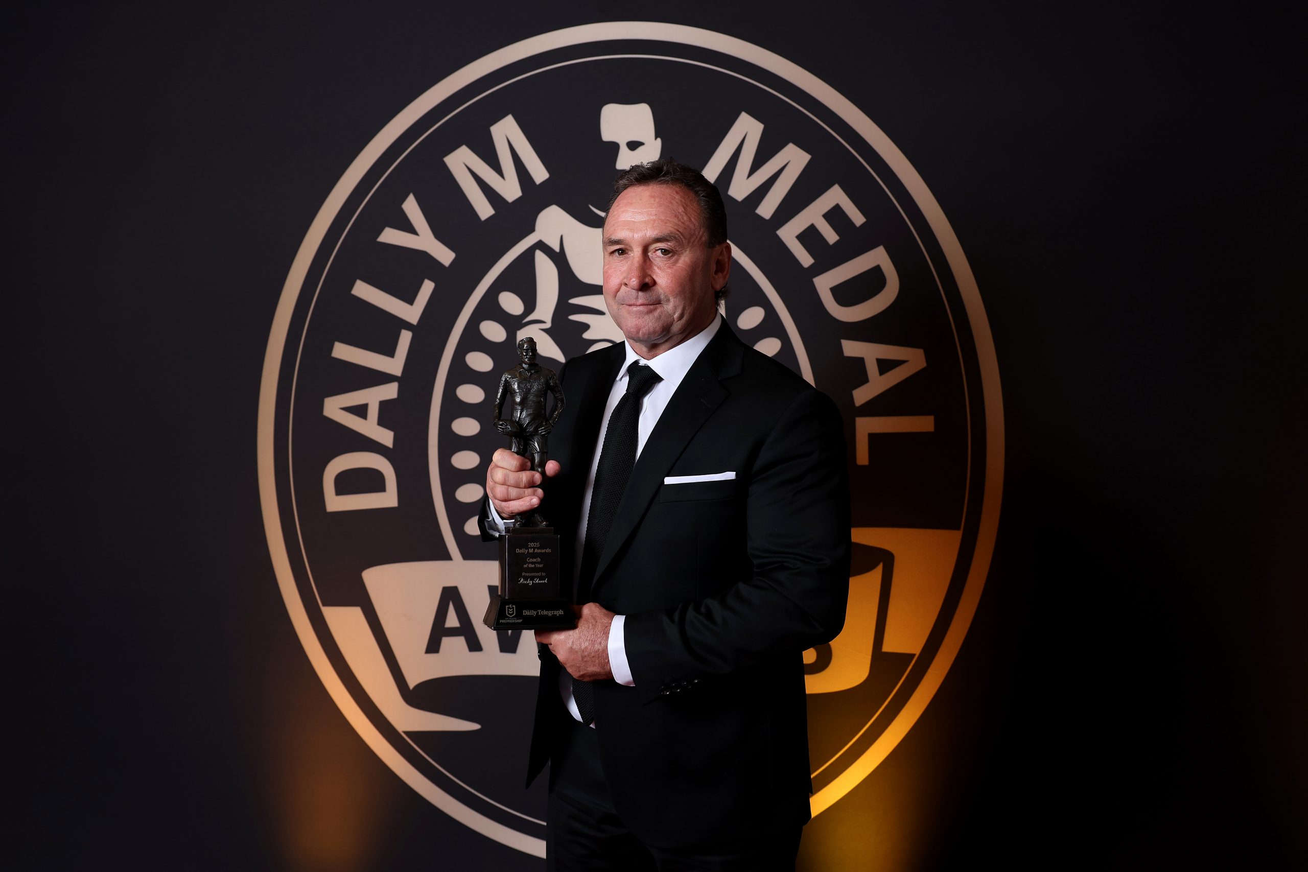 Ricky Stuart with his 2025 Dally M Coach of the Year gong.