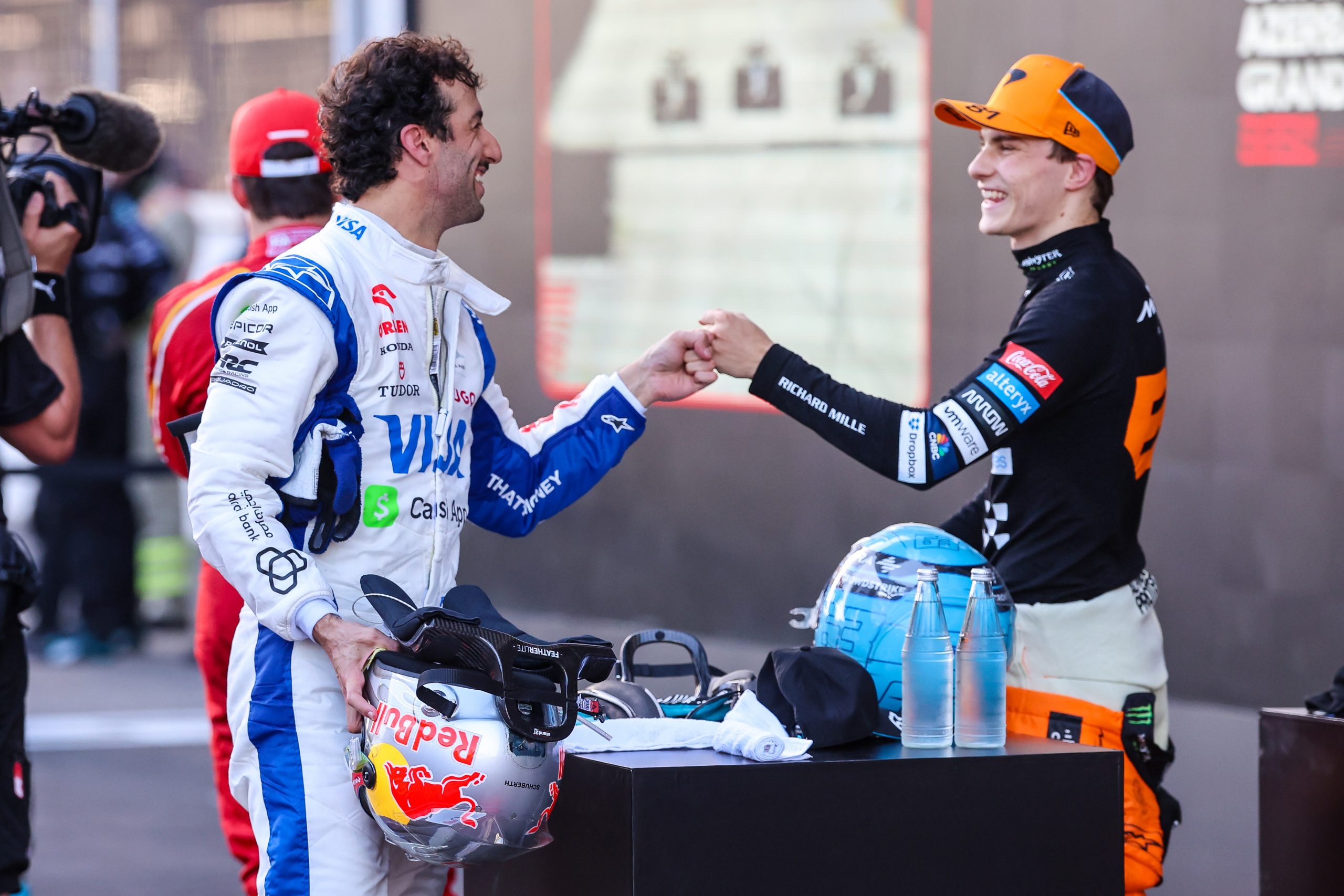Daniel Ricciardo of Australia and Visa Cash App RB congratulates race winner Oscar Piastri of Australia and McLaren during the F1 Grand Prix of Azerbaijan at Baku City Circuit on September 15, 2024 in Baku, Azerbaijan. (Photo by Kym Illman/Getty Images)