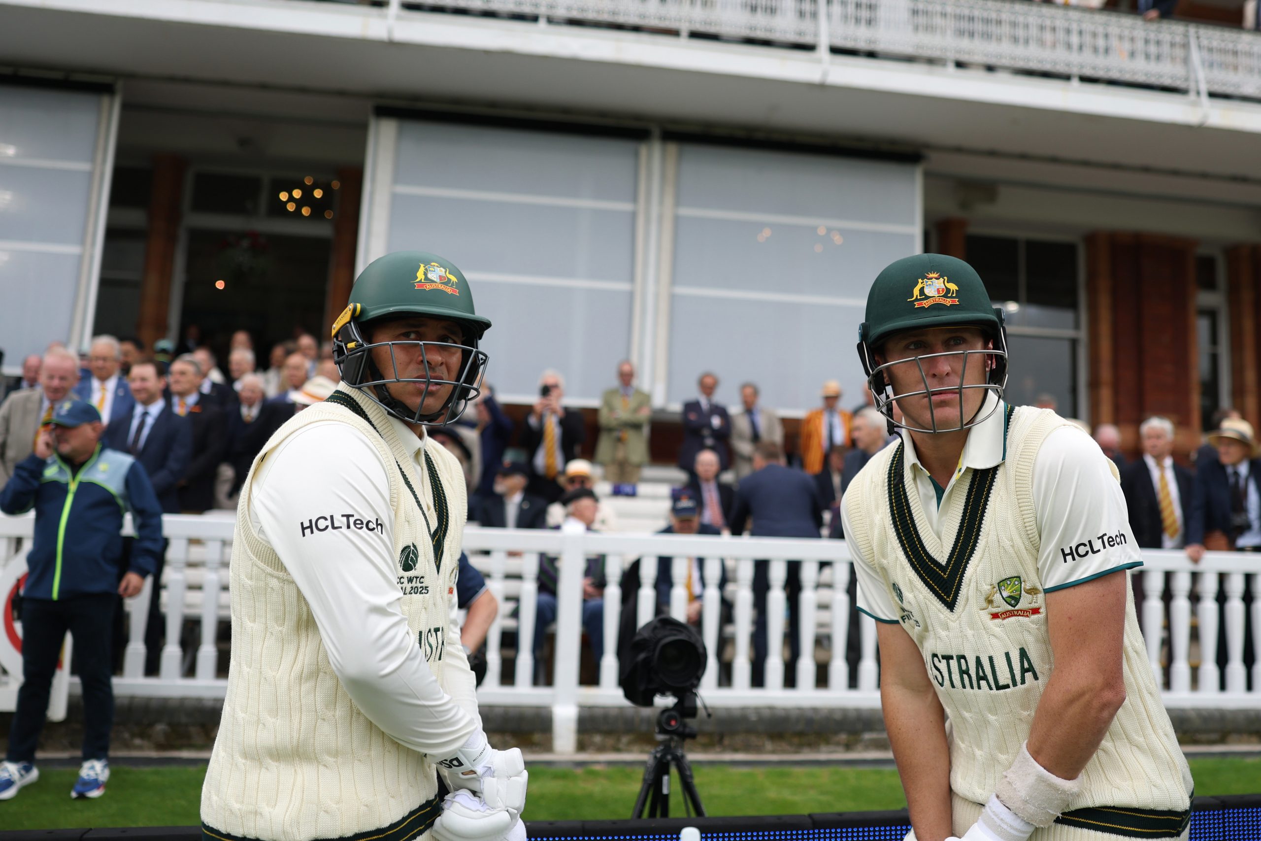 LONDON, ENGLAND - JUNE 11: Marnus Labuschagne and Usman Khawaja of Australia walk out to bat during Day One of the ICC World Test Championship Final 2025 between South Africa and Australia at Lord's Cricket Ground on June 11, 2025 in London, England.  (Photo by Alex Davidson-ICC/ICC via Getty Images)