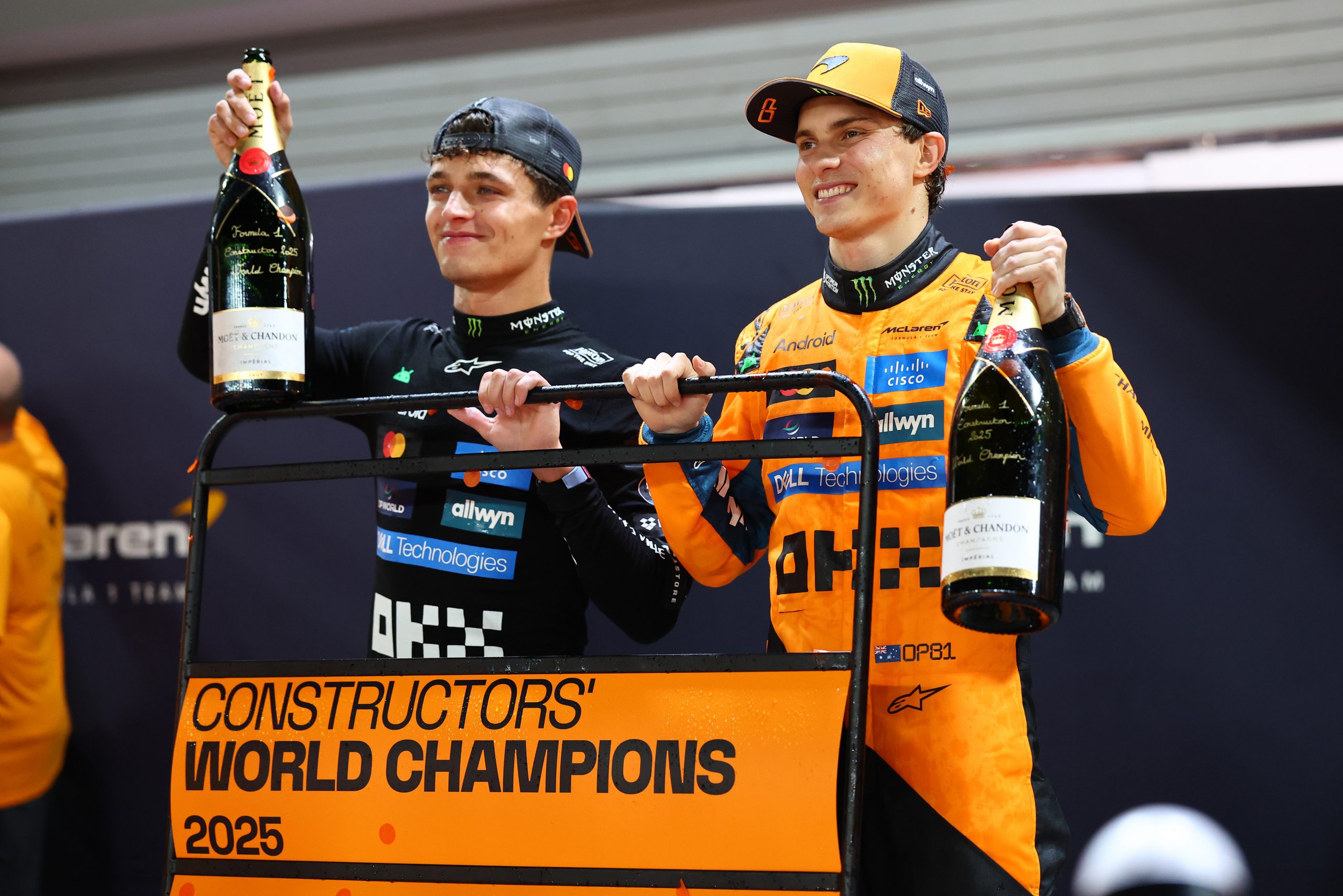 Lando Norris and Oscar Piastri celebrate McLaren winning the constructors' championship.