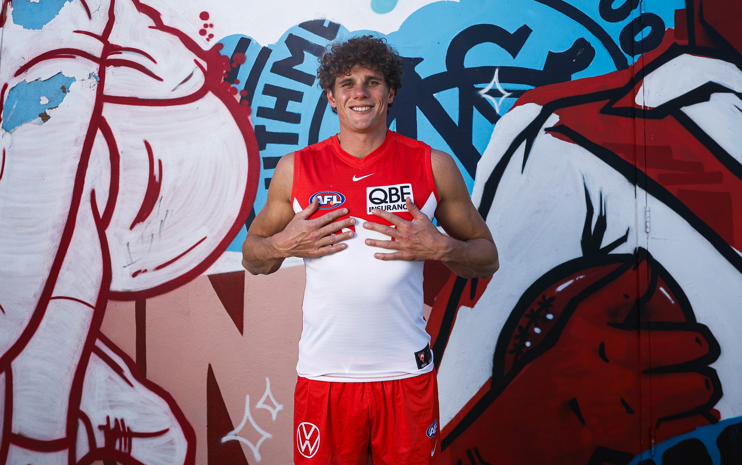 Charlie Curnow poses after being traded to Sydney