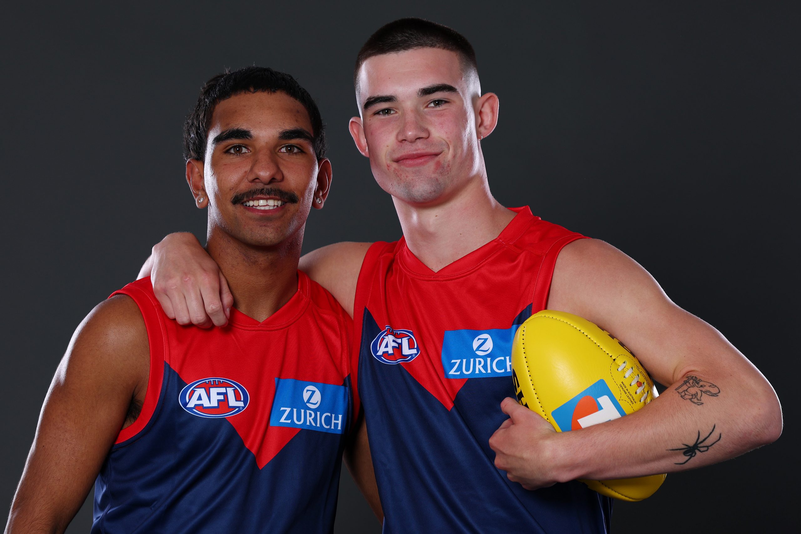 Latrelle Pickett and Xavier Taylor pose after being selected by the Demons as part of the 2025 AFL Draft 