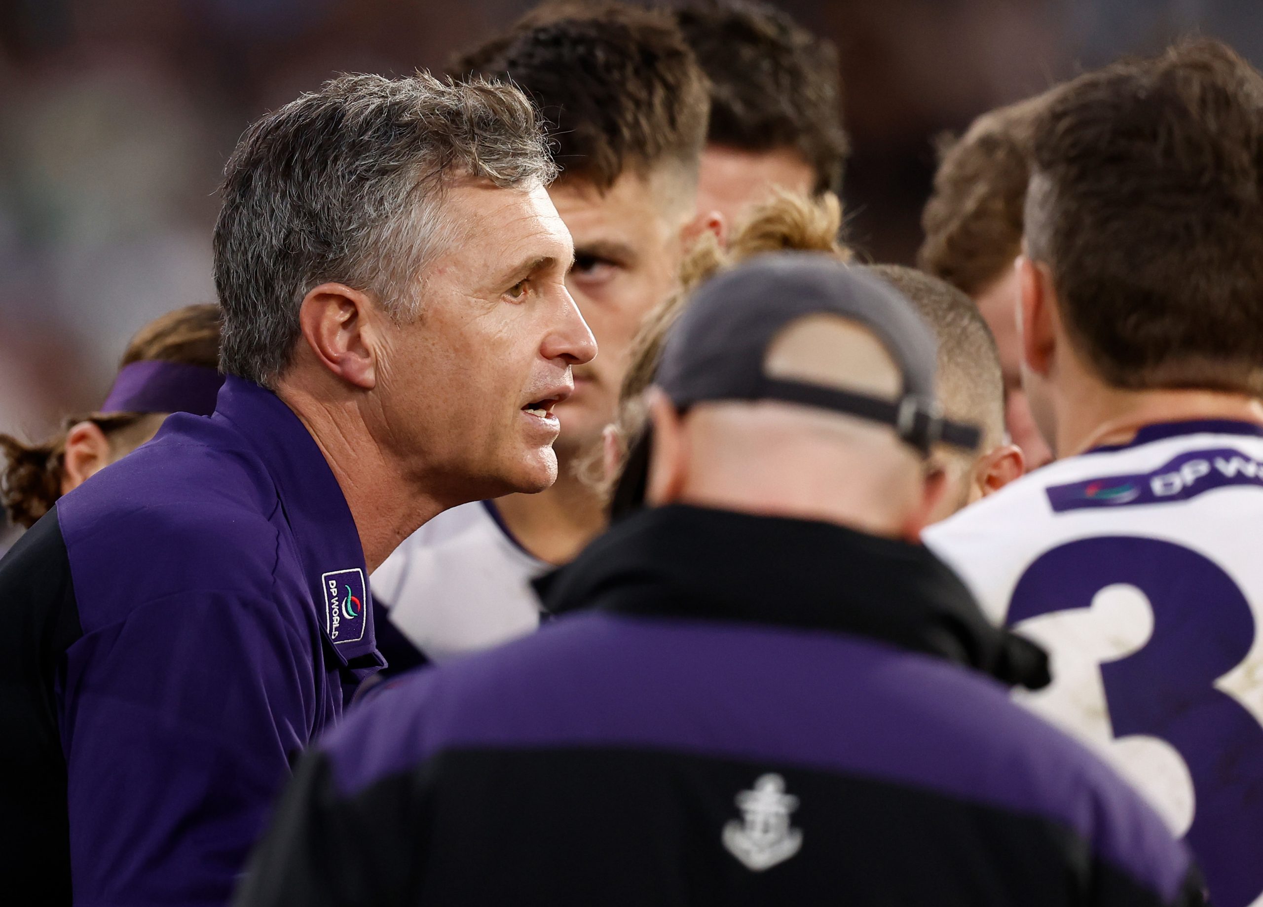 Justin Longmuir, Senior Coach of the Dockers addresses his players during the 2025 AFL Round 19 match between the Collingwood Magpies and the Fremantle Dockers at the Melbourne Cricket Ground on July 20, 2025 in Melbourne, Australia. (Photo by Michael Willson/AFL Photos via Getty Images)