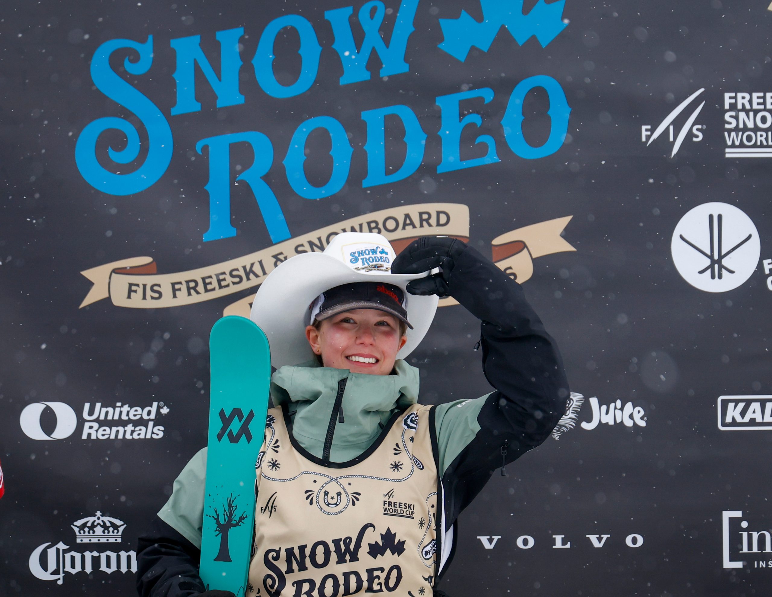 Australia's Indra Brown celebrates her victory on the podium following the women's World Cup freeski halfpipe event in Calgary in January.