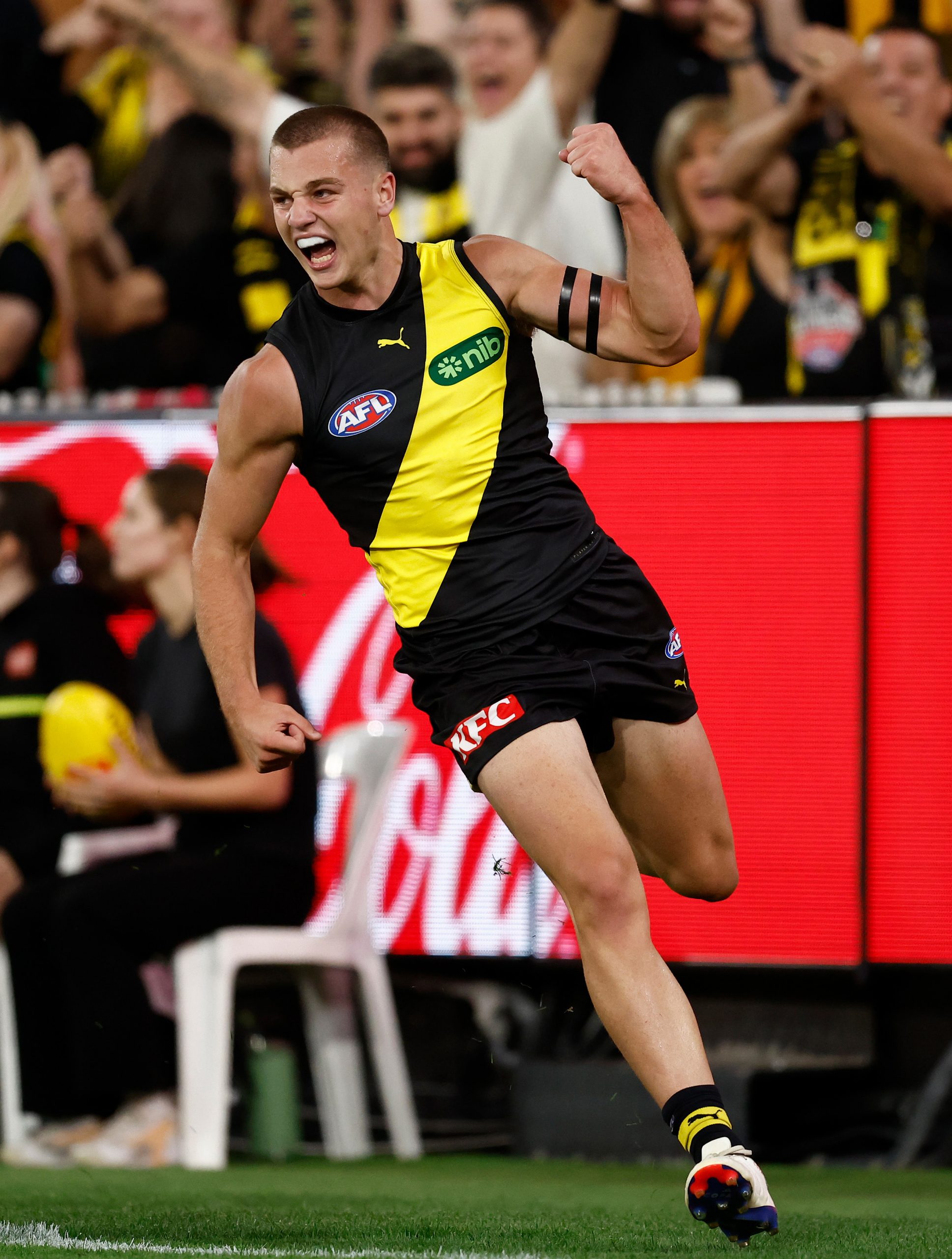 Sam Lalor of the Tigers celebrates his first league goal.