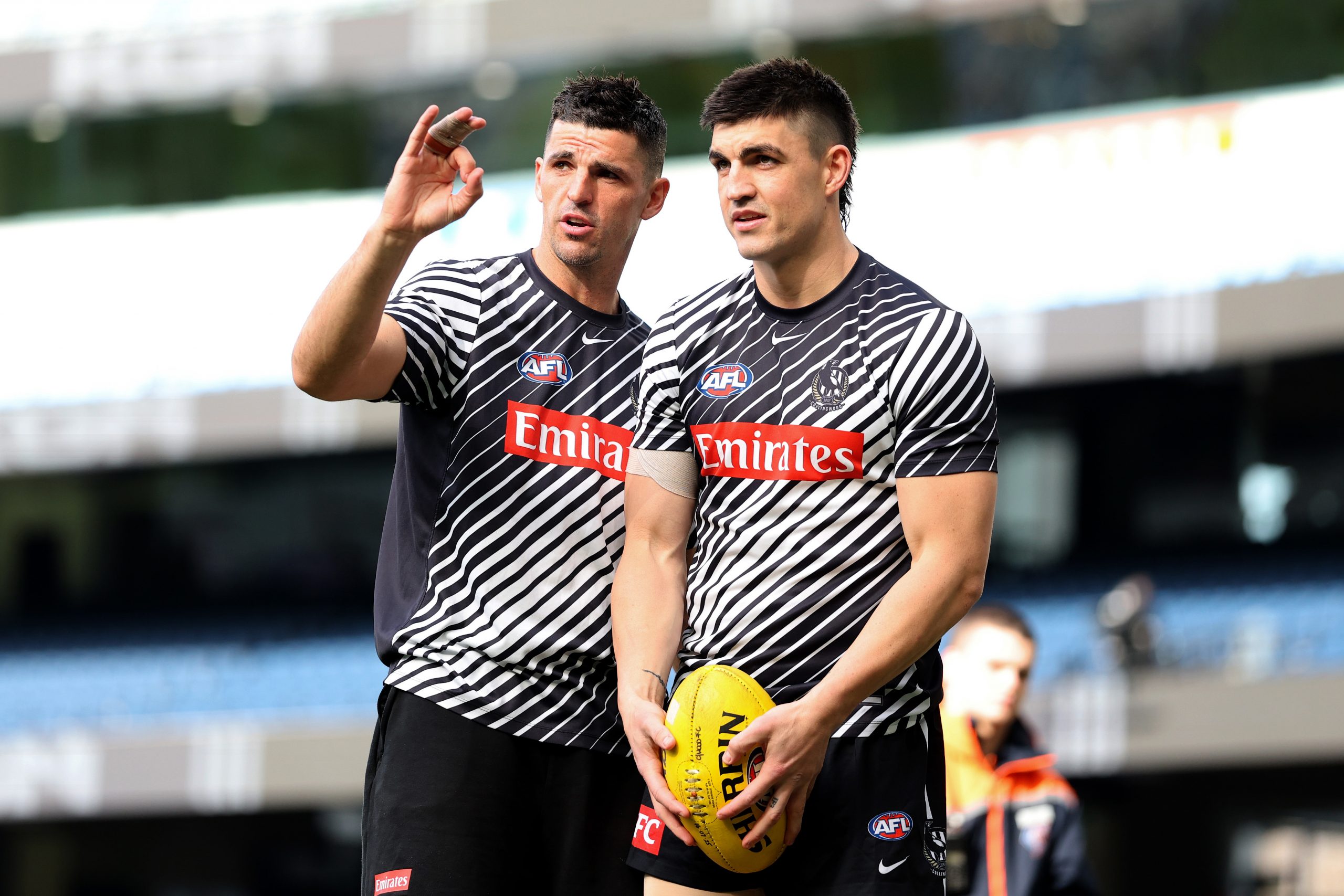 MELBOURNE, AUSTRALIA - JULY 20: Scott Pendlebury and Brayden Maynard of the Magpies look on ahead of the round 19 AFL match between Collingwood Magpies and Fremantle Dockers at Melbourne Cricket Ground on July 20, 2025 in Melbourne, Australia. (Photo by Robert Cianflone/Getty Images)