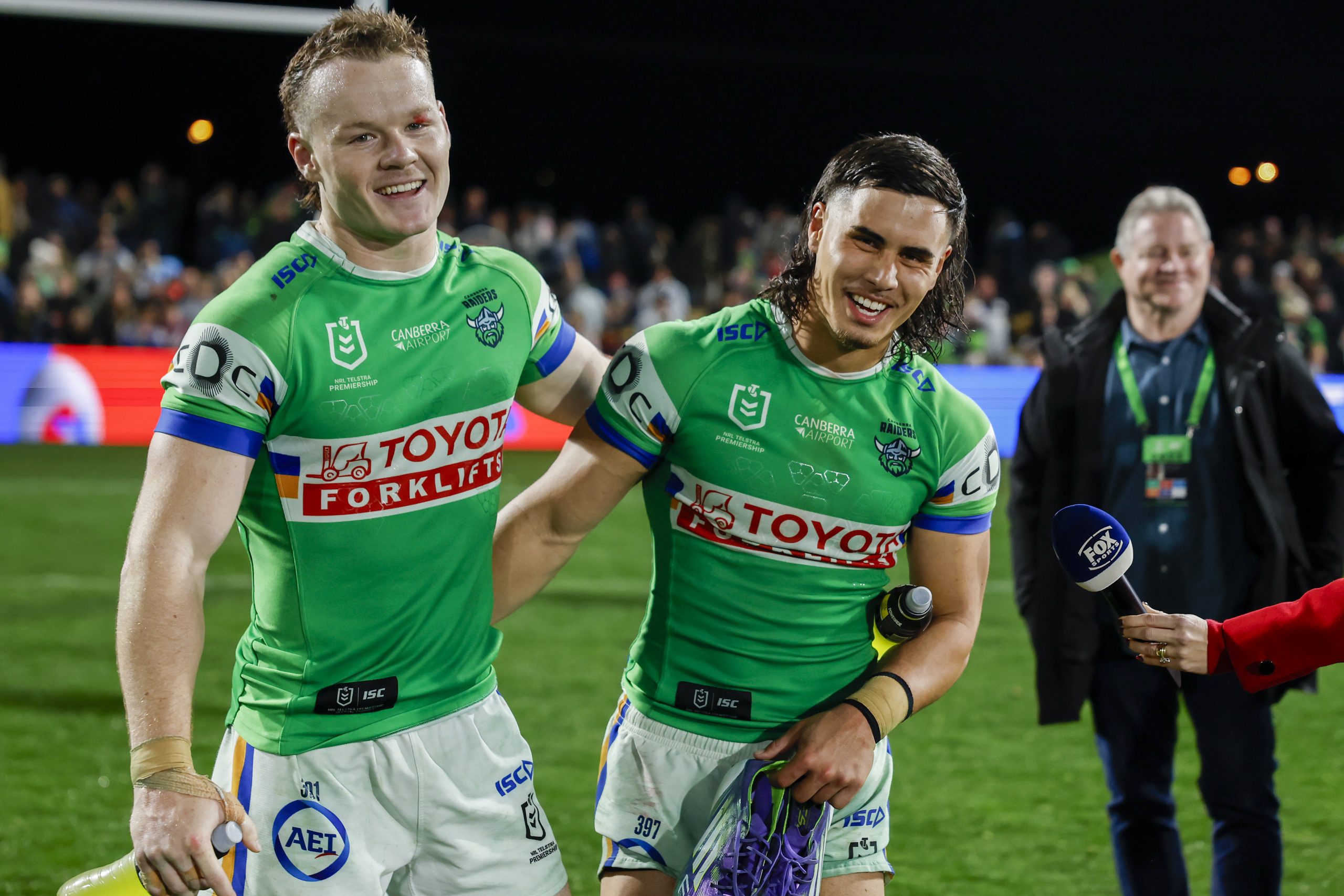 MUDGEE, AUSTRALIA - AUGUST 22: Ethan Strange and Kaeo Weekes of the Raiders celebrate victory during the round 25 NRL match between Penrith Panthers and Canberra Raiders at Glen Willow Sporting Complex, on August 22, 2025, in Mudgee, Australia. (Photo by Mark Evans/Getty Images)