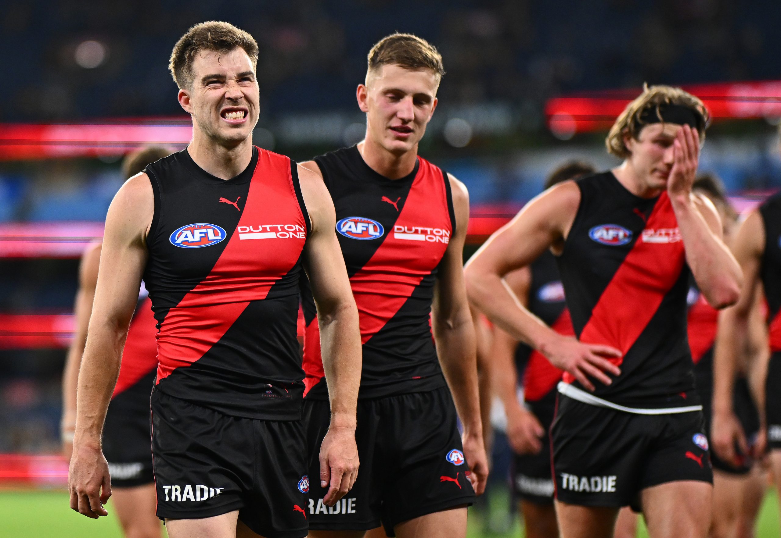 Zach Merrett of the Bombers looks dejected after losing to the Hawks.