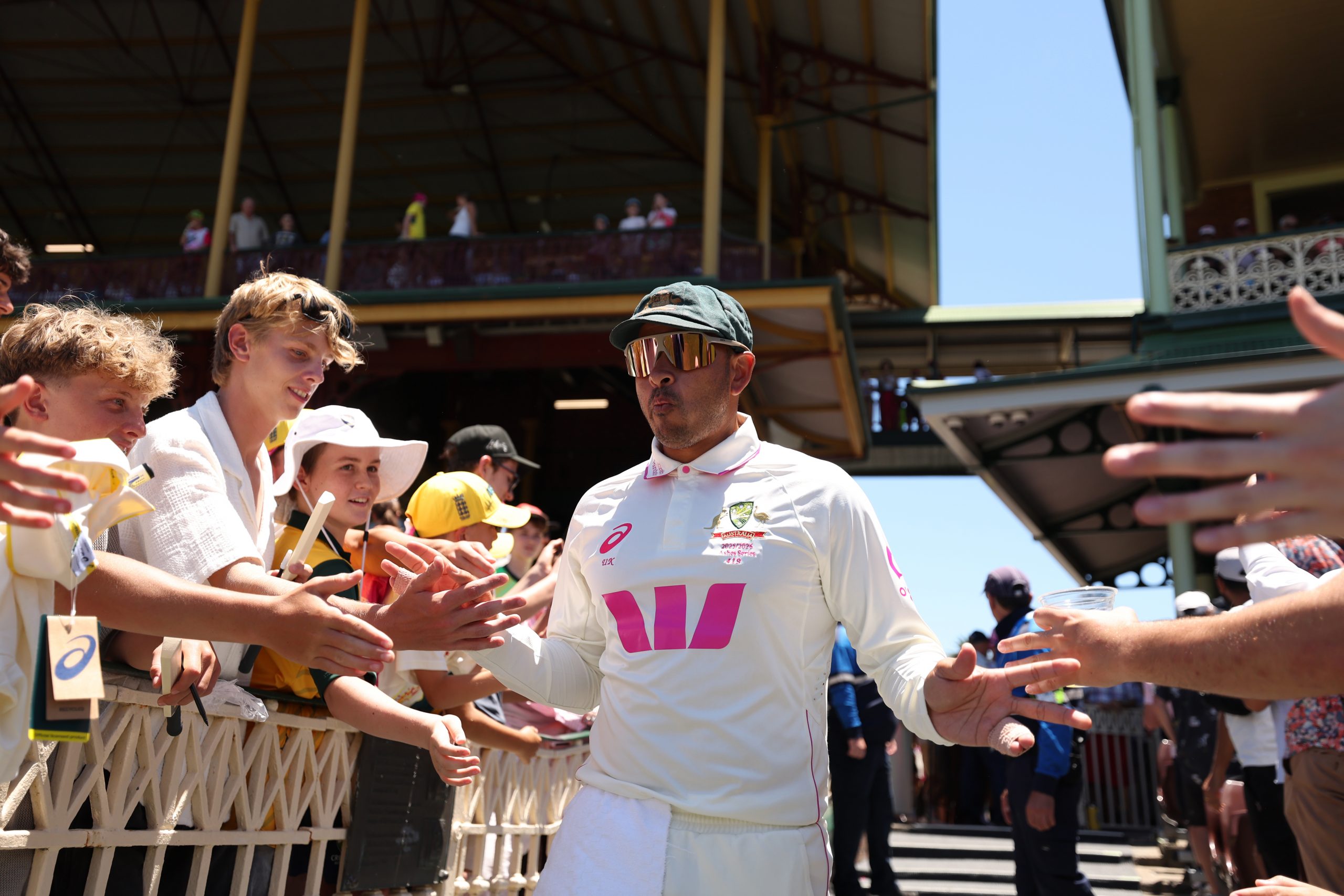 Usman Khawaja of Australia heads out onto the SCG for his final day of Test cricket.