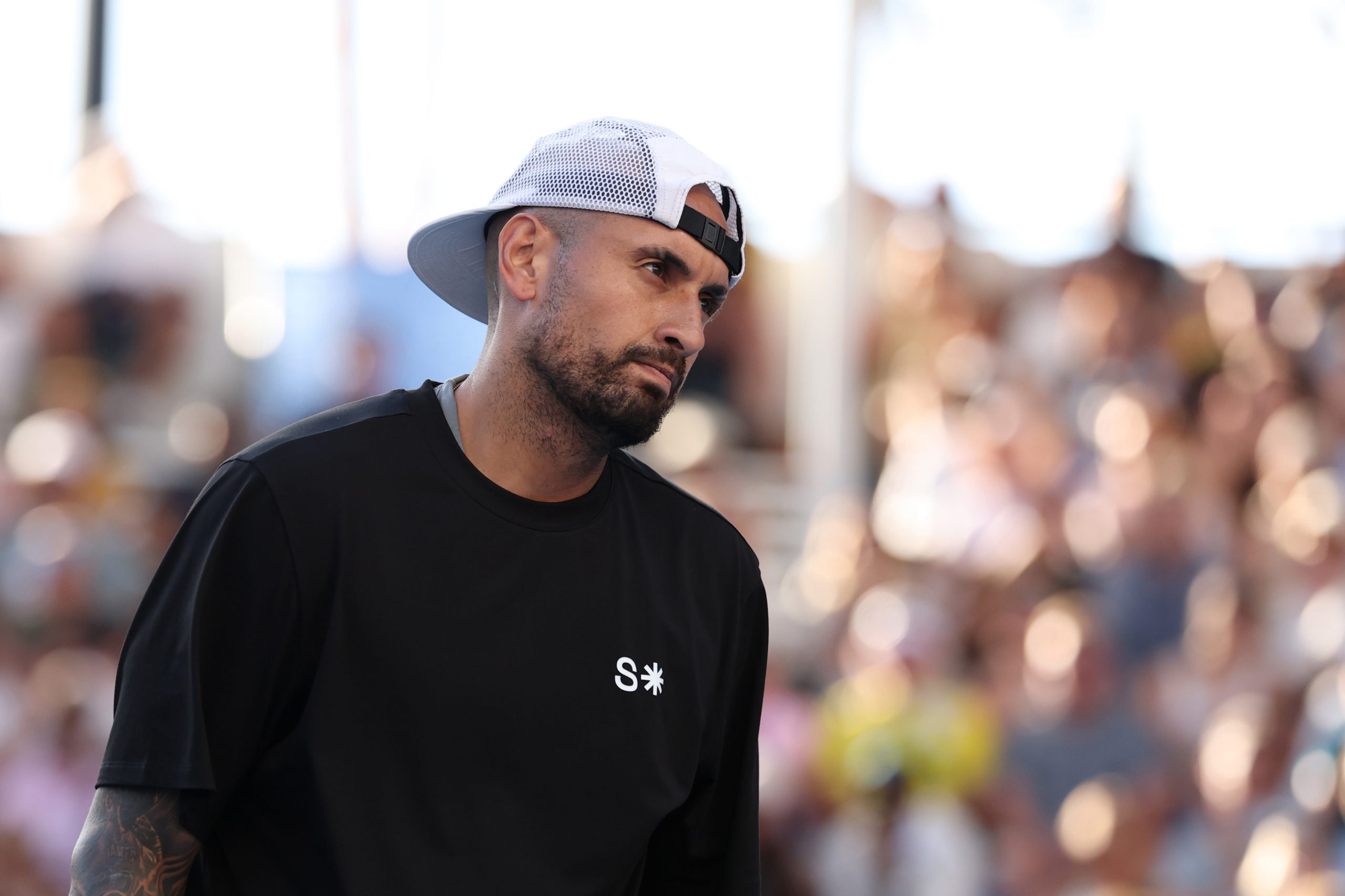 Nick Kyrgios  in action alongside Canada's Leylah Fernandez during their mixed doubles debut.