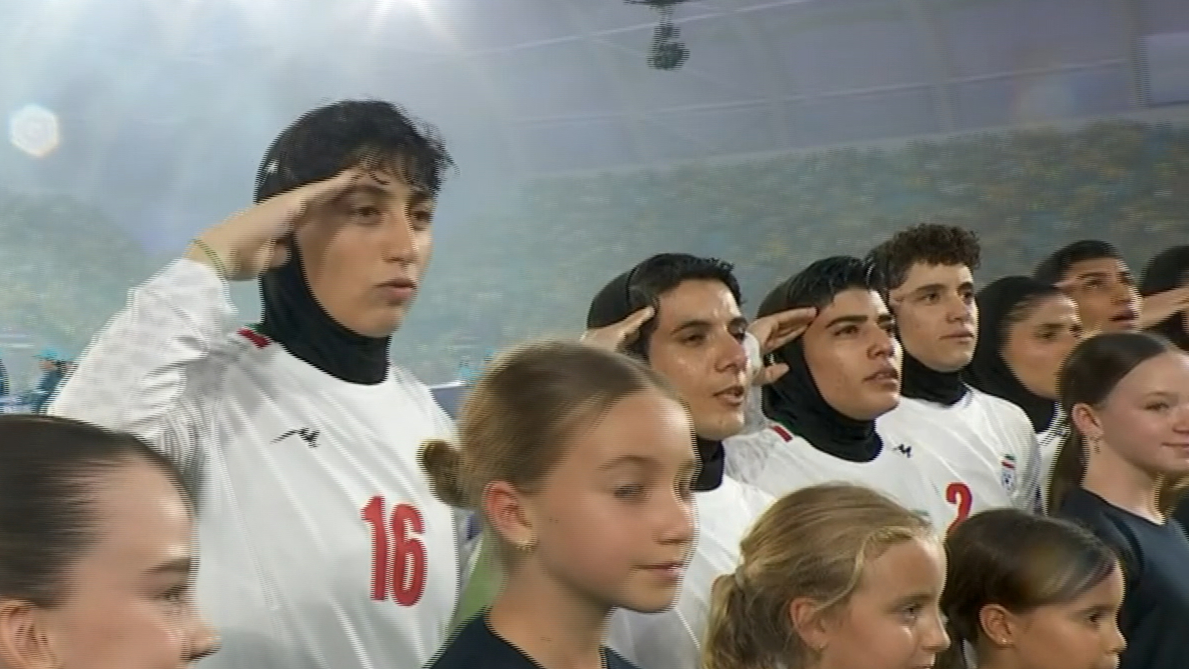 Iranian players salute during anthem ahead of Matildas clash