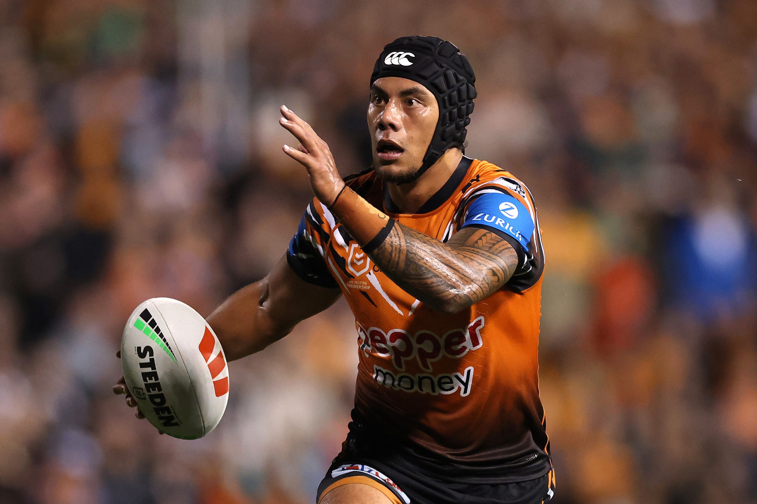 SYDNEY, AUSTRALIA - APRIL 23: Jarome Luai of the Wests Tigers runs the ball during the round eight NRL match between the Wests Tigers and Canberra Raiders at Leichhardt Oval on April 23, 2026 in Sydney, Australia. (Photo by Cameron Spencer/Getty Images)