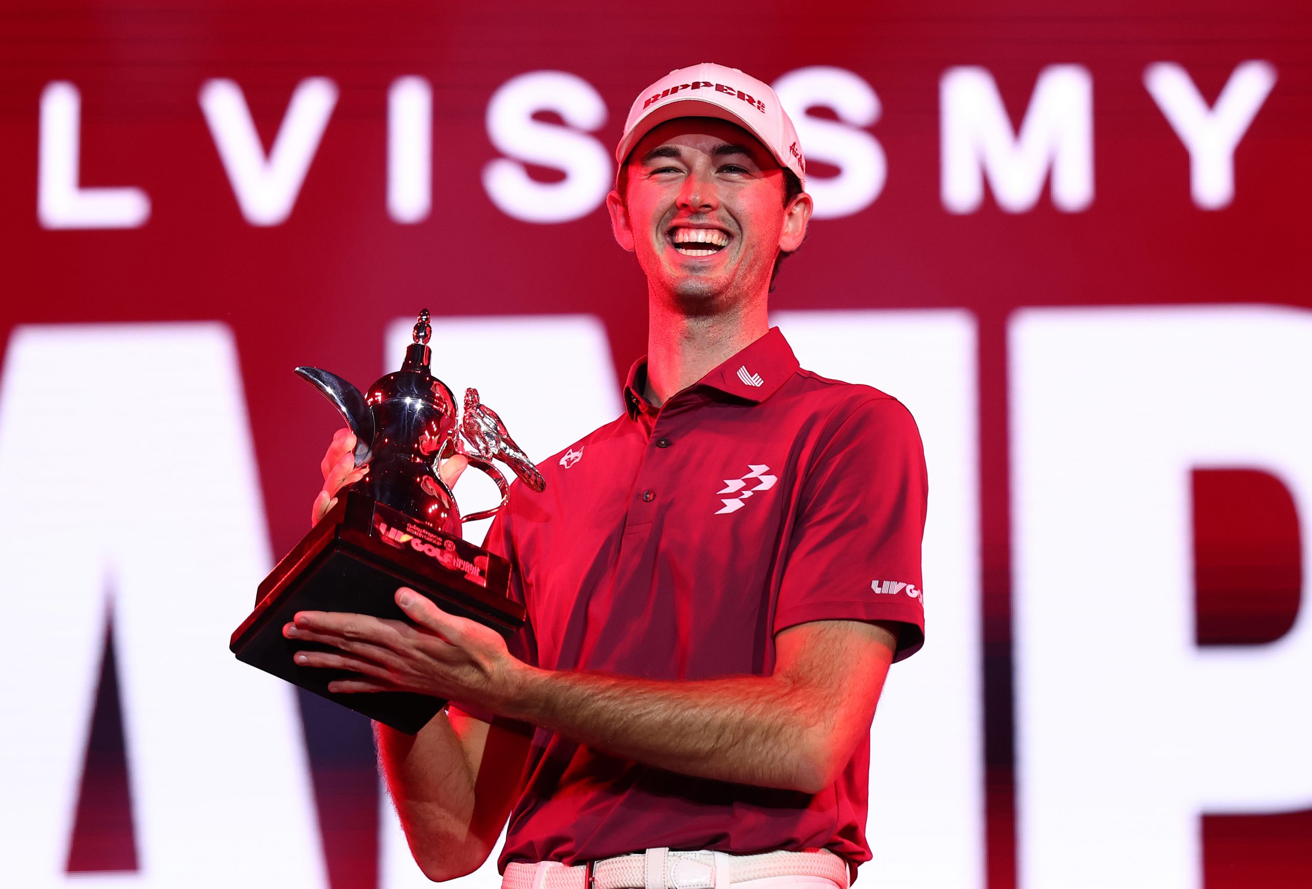 Elvis Smylie of Ripper GC poses for a photo with the trophy after winning the final round.