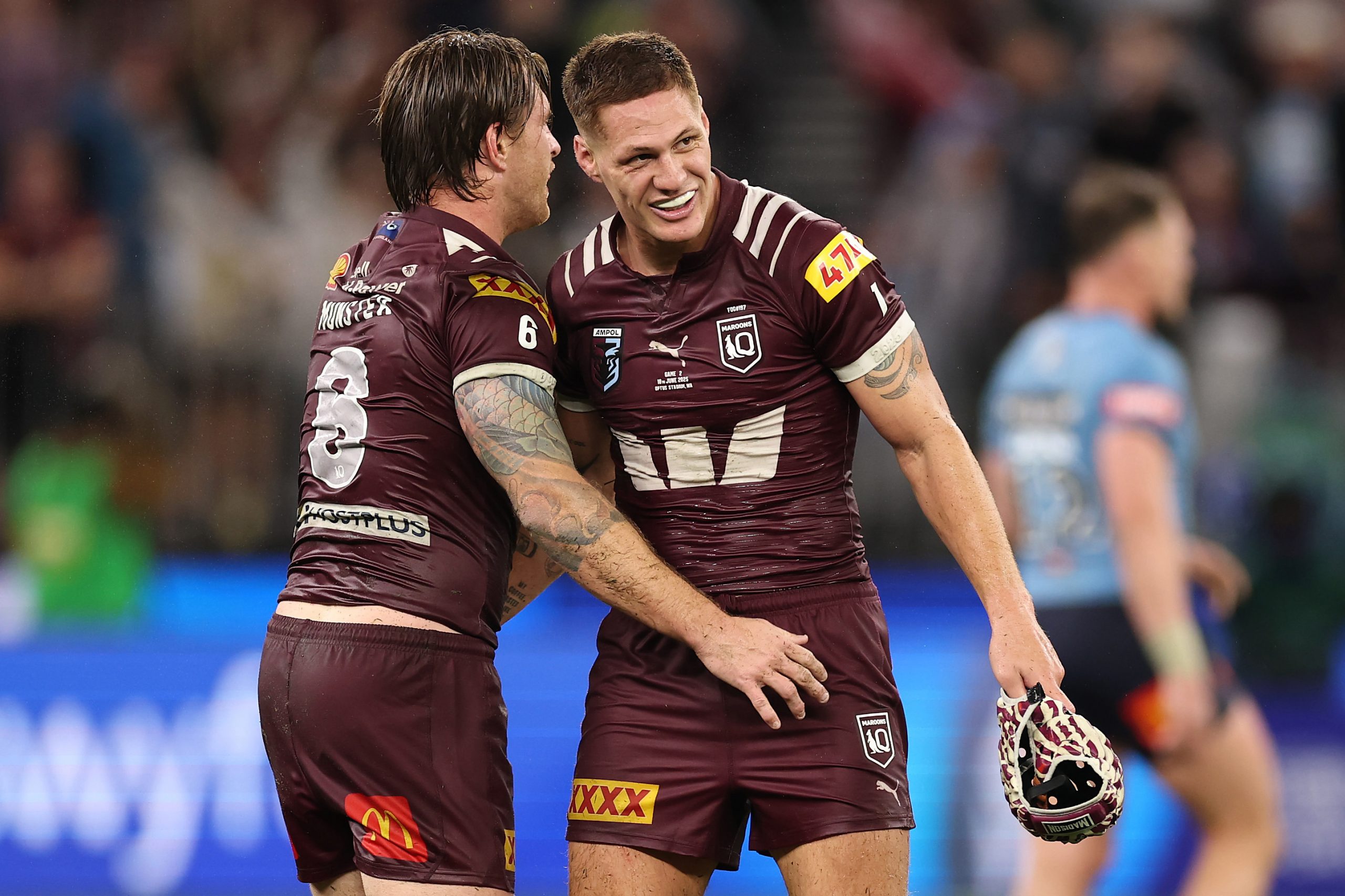 Cameron Munster and Kalyn Ponga celebrate during game two of the Men's State of Origin series between Queensland Maroons and New South Wales Blues at Optus Stadium on June 18, 2025 in Perth, Australia. (Photo by Cameron Spencer/Getty Images)